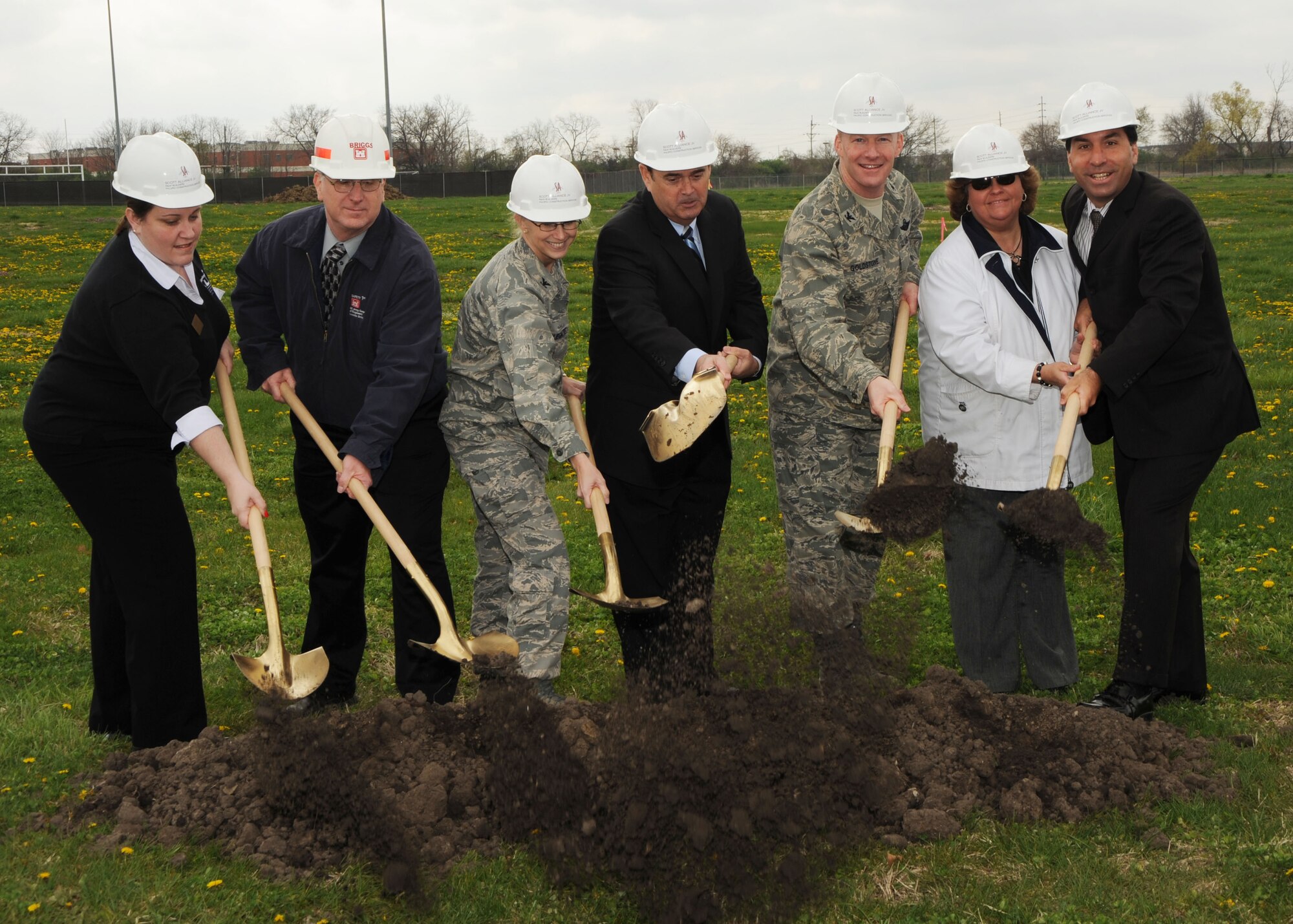 SCOTT AIR FORCE BASE, Ill. --Kelly McConnell, Child Development Center director; John Briggs, Army Corps of Engineers Louisville District deputy chief of construction; Col. Melissa Applegate, 375th Mission Support Group commander; U.S. Rep. Jerry Costello; Col. Gary Goldstone, 375th Airlift Wing commander, and Jill Rutter and Rick Glodman of Scott Alliance Joint Venture Partners break ground on Scott Air Force Base's new child development center Thursday. (U.S. Air Force photo/Tech. Sgt. Michelle Larche) 