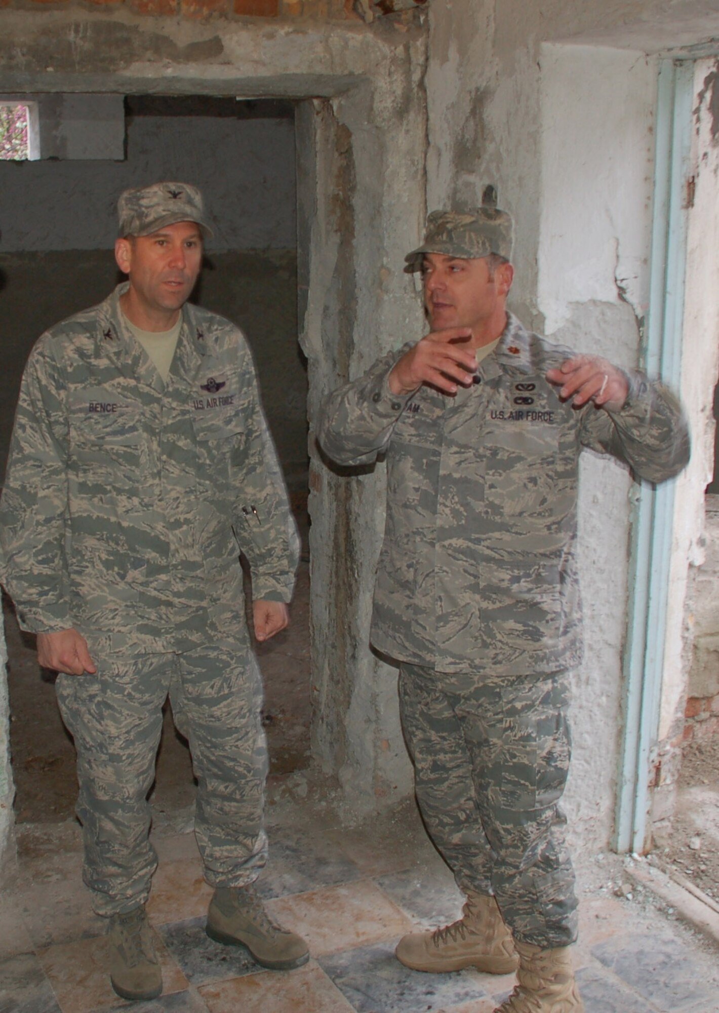 Maj. Johnnie Adam shows Col. Christopher Bence, 376th Air Expeditionary Wing commander, the progress at Birdik Village School after a ceremony  April 14 at the Kyrgyz Republic school, Major Adam is overseeing a $470,000 project to renovate the 200-student school during his deployment to nearby Manas Air Base. The renovation project is in a partnership with U.S. Central Command, the State Department and Manas Air Base. (U.S. Air Force photo/Tech. Sgt. Phyllis Hanson) 