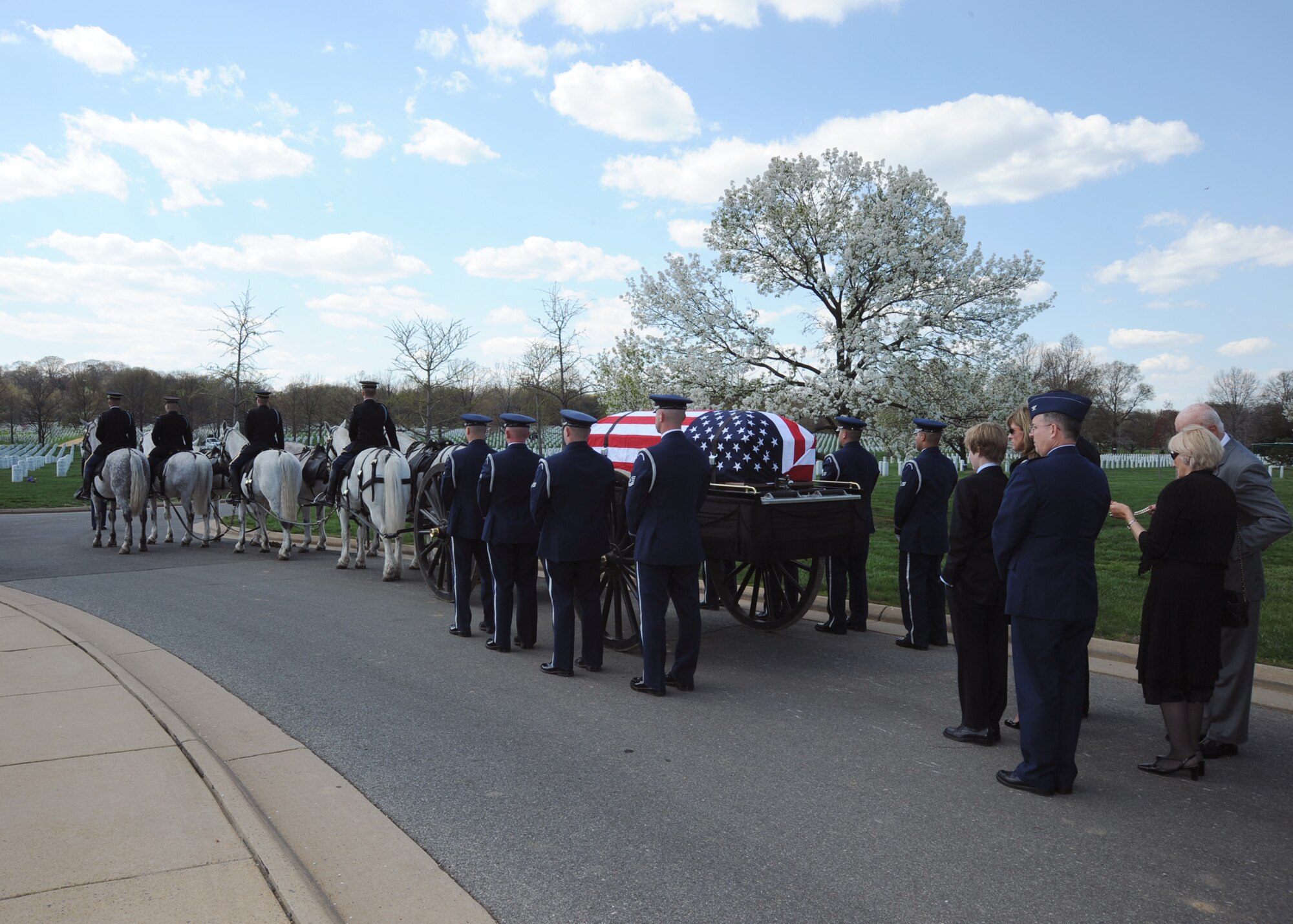 ARLINGTON NATIONAL CEMETERY, Va. -- The family of Col. Michael Krueger, former 22nd Air Refueling Wing vice commander, and the horse wagon pulling the casket, wait to begin the march to the interment site for him, April 9. Many Team McConnell members, friends and family came to give their support to Colonel Krueger’s family and to pay their respect to the vice commander who passed away March 3. (Photo by Airman 1st Class Maria Ruiz)