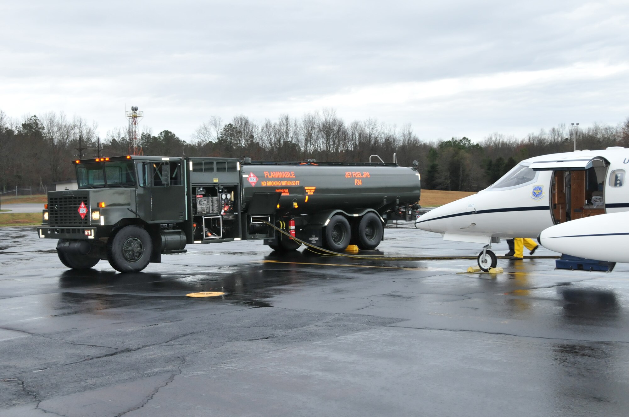 Arnold Engineering Development Center’s (AEDC) newest aircraft refueler recently completed its first refueling at the airfield. The refueler is a 1989 model R-11 and can hold 6,000 gallons of JP8 fuel. This refueler is Air Force owned equipment and is operated by fuels personnel. The R-11 refuels the aircraft Air Force Materiel Command Commander Gen. Donald Hoffman departed in after his recent visit. (Photo by David Housch)
