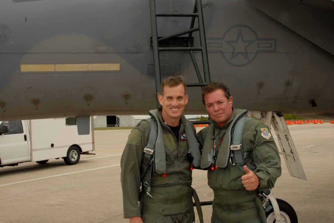 Lieutenant Col. John Black poses with Mr. Shareef Malnik before take-off.  Mr. Malnik was invited to the 125th Fighter Wing, Jacksonville, Fla., as a distinguished visitor on April 14, 2009.