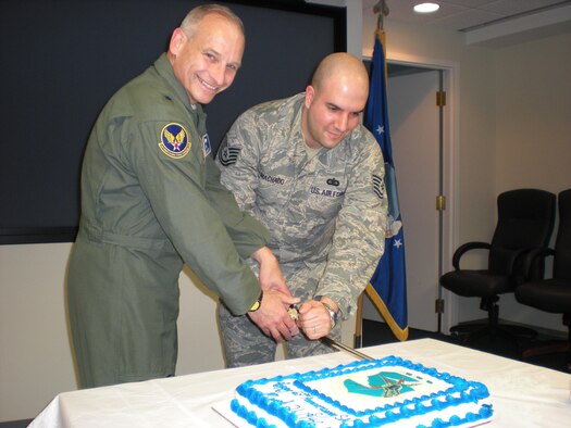 Brig. Gen. James Kowalski, AFGSC (P) commander (left) and Tech. Sgt. Robert Machado, AFGSC (P) command section, cut a ceremonial birthday cake here, March 31. SAC originaly stood up March 21, 1946, at Bolling AFB. 