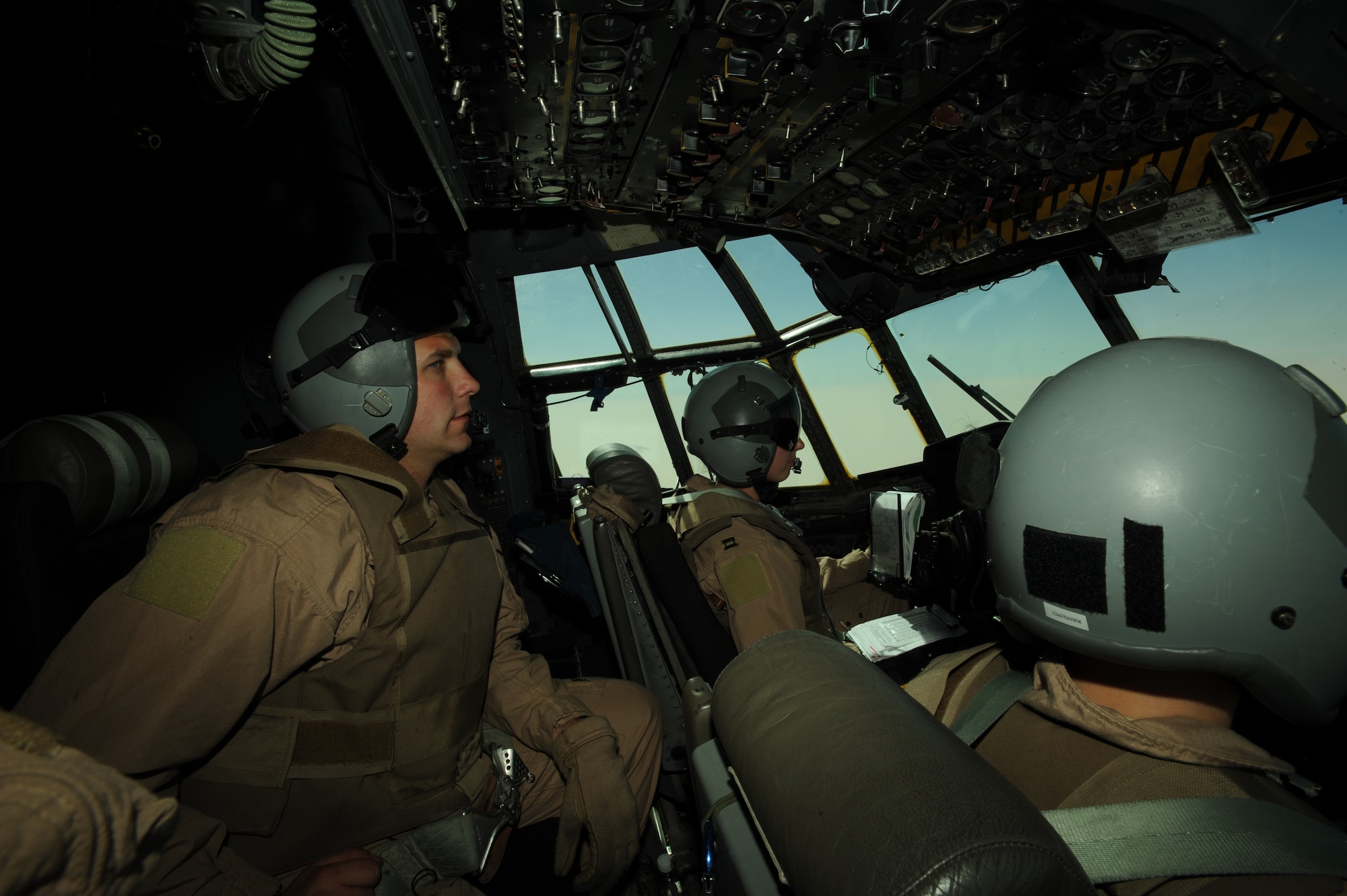 U.S. Air Force C-130 Hercules aircrew, assigned to the 777th Expeditionary Airlift Squadron, Joint Base Balad, Iraq, conduct airlift operations April 8, 2009, in support of Operation Iraqi Freedom.  (U.S. Air Force photo by Staff Sgt. James L. Harper Jr.)