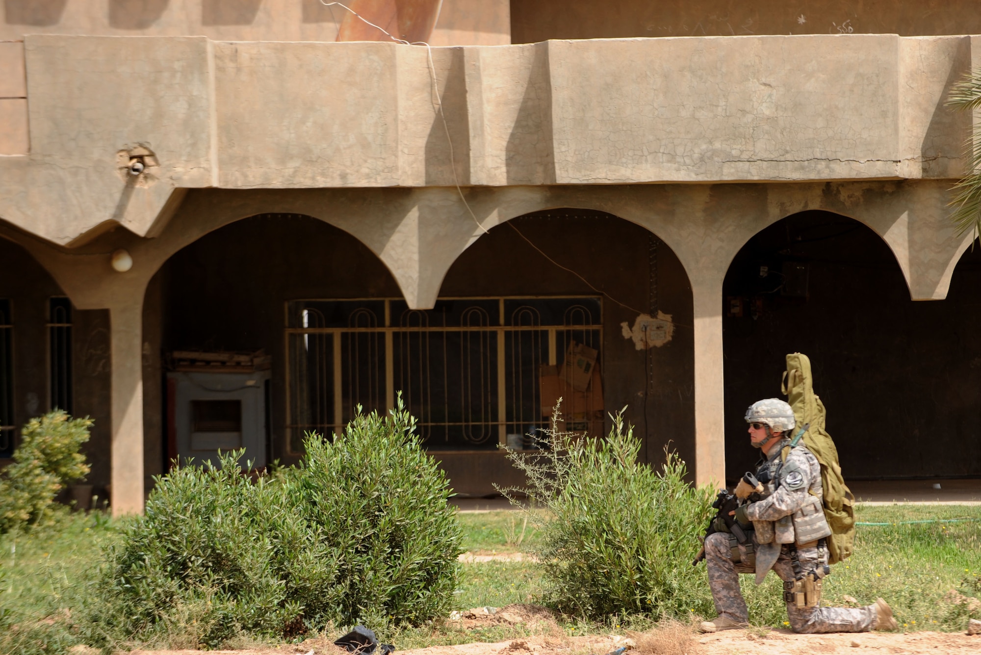 U.S. Air Force Senior Airman Brian Hafner, 532nd Security Forces Squadron, Joint Base Balad, Iraq, conducts security during a patrol in Bakr Village April 9, 2009, in support of Operation Iraqi Freedom.  (U.S. Air Force photo by Staff Sgt. James L. Harper Jr.)