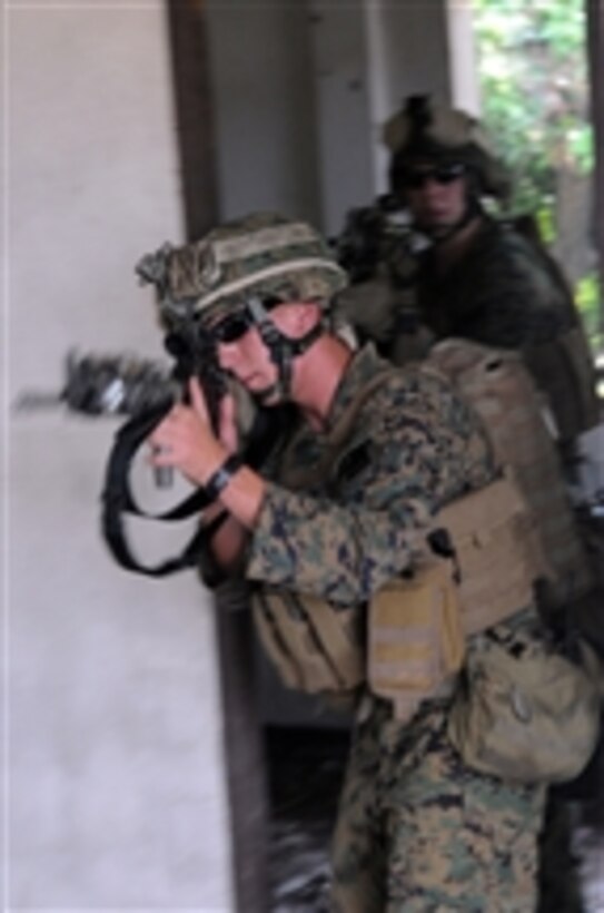 U.S. Marine Corps and Philippine marine forces conduct an air raid exercise at Basa Air Base, Philippines, during Balikatan 2009 on April 14, 2009.  The purpose of Balikatan 09 is to conduct bilateral training between the Philippine and U.S. military, to maintain readiness and to sustain a long-term security assistance relationship.  