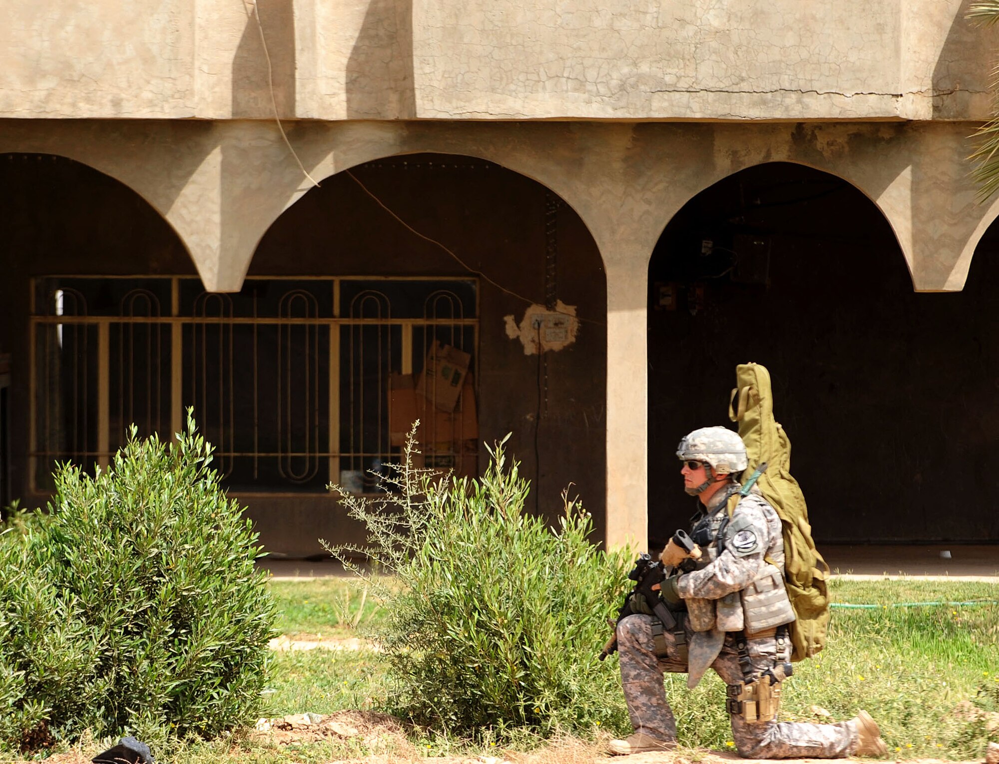 Senior Airman Brian Hafner conducts security during a patrol in Bakr Village April 9 in support of Operation Iraqi Freedom. He is assigned to the 532nd Security Forces Squadron at Joint Base Balad, Iraq. (U.S. Air Force photo/Staff Sgt. James L. Harper Jr.)