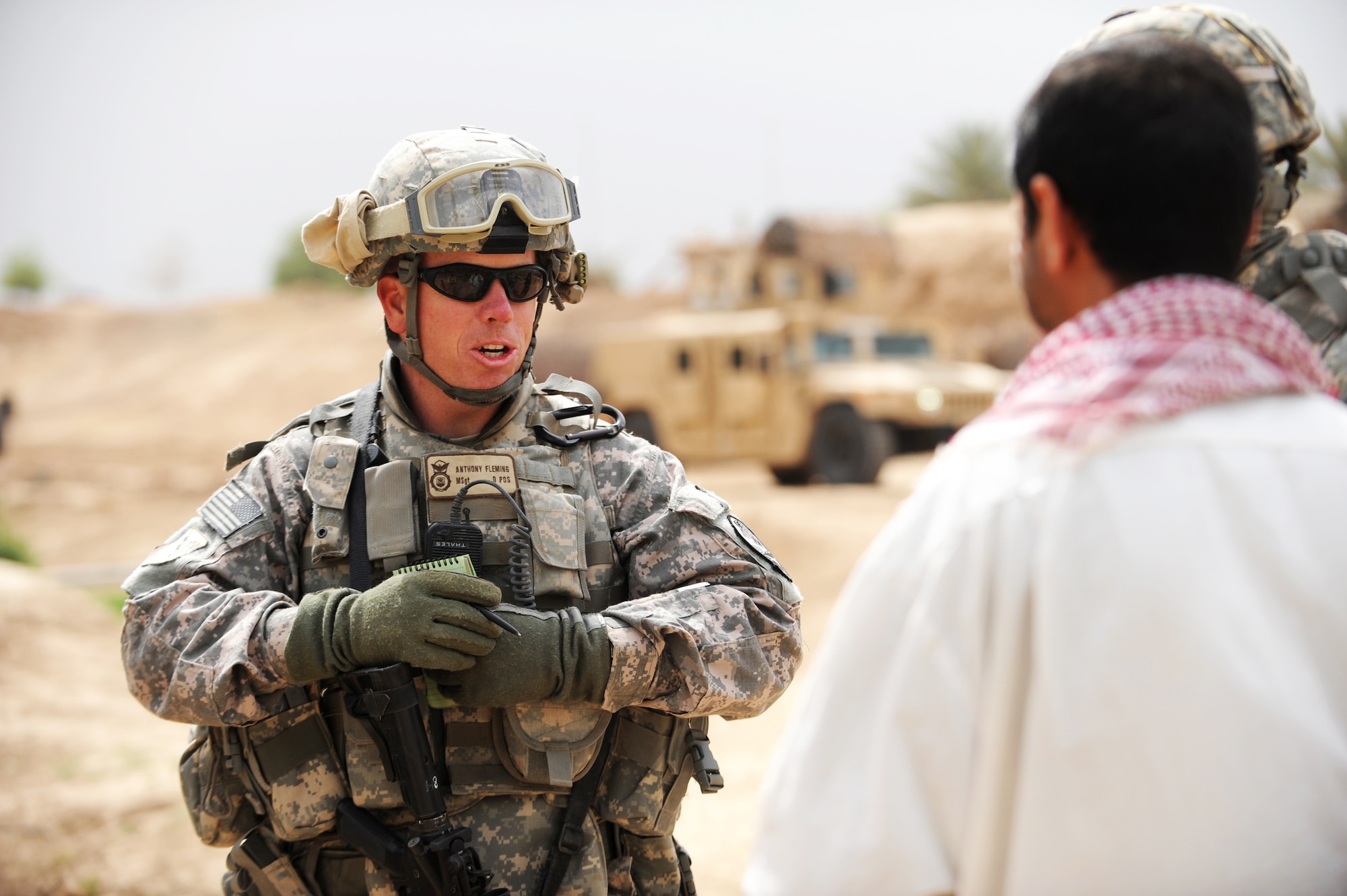 Master Sgt. Anthony Fleming conducts an interview April 9 with an Iraqi villager from Bakr.  He is assigned to the 532nd Expeditionary Security Forces Squadron at Joint Base Balad, Iraq.  (U.S. Air Force photo/Staff Sgt. James L. Harper Jr.)