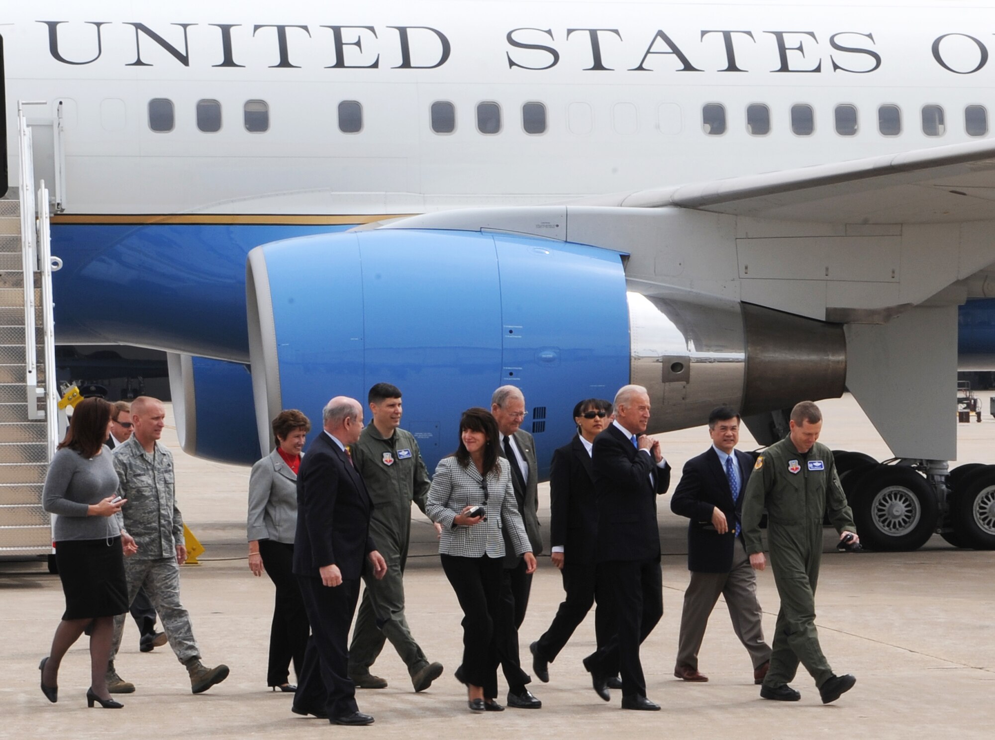 Vice President Joe Biden walks from Air Force Two after landing at Whiteman Air Force Base, Mo., April 16.  He is escorted by Col. Robert Wheeler, 509th Bomb Wing commander, and Col. John Robinson, 509th BW vice commander.  He was visiting the base to show the administration’s support for the troops.  Later, Mr. Biden visited Jefferson City and the University of Missouri-St. Louis to highlight progress of the Recovery Act. (U.S. Air Force photo/Airman 1st Class Carlin Leslie)