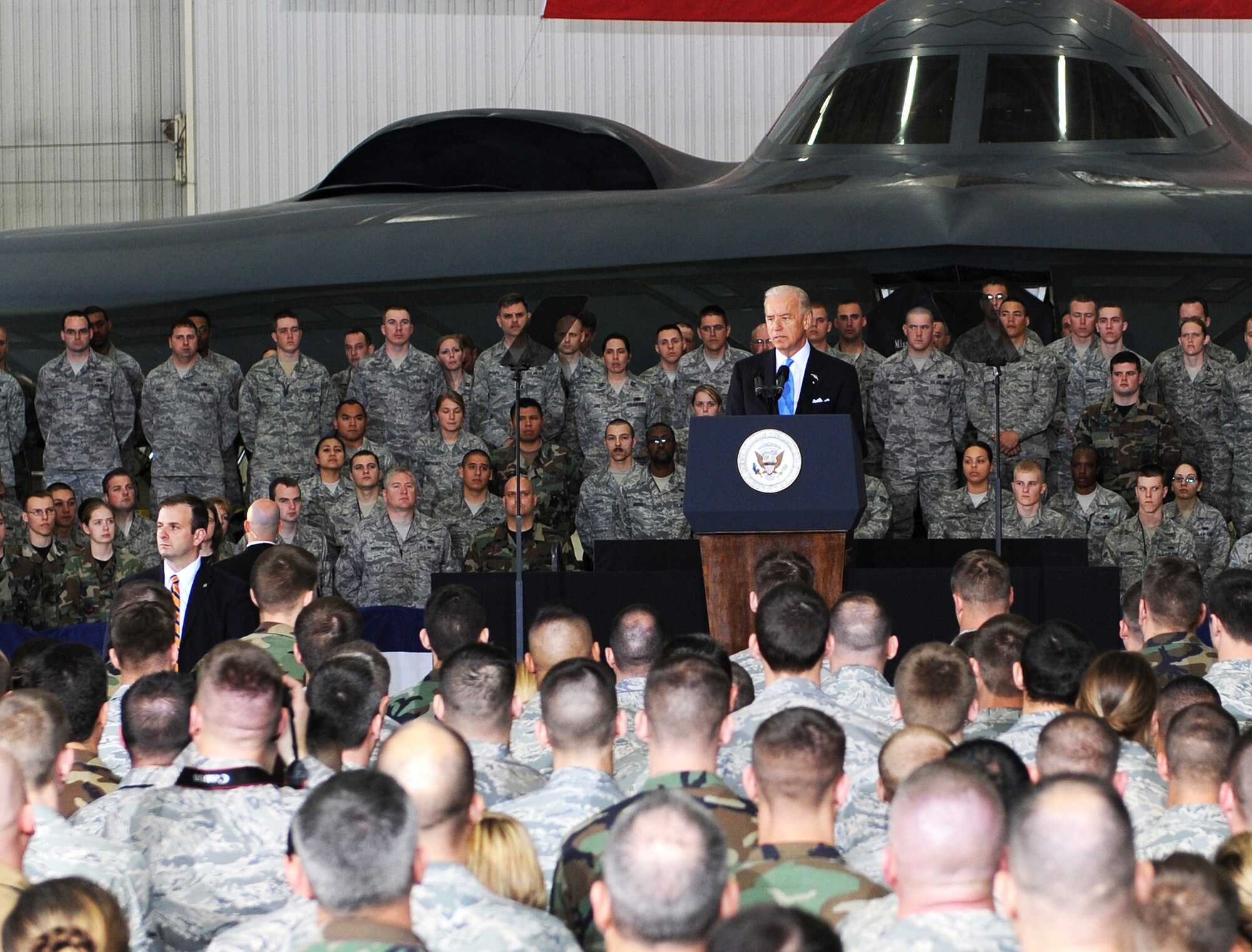Vice President Joe Biden addresses the troops during a visit to Whiteman Air Force Base, Mo., April 16.  He was there to show the administration's support for the troops.  Mr. Biden later visited Jefferson City and the University of Missouri-St. Louis to highlight progress of the Recovery Act. (U.S. Air Force photo/Airman 1st Class Carlin Leslie)