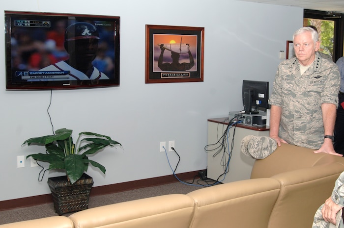 Gen. Arthur Lichte tours the newly opened Airmen Ministry Center and Internet Cafe during his visit to Charleston AFB April 16. General Lichte toured various base facilities and spoke with Airmen to discuss any issues they had on their minds. General Lichte is the commander of Air Mobility Command, Scott AFB, Ill. (U.S. Air Force photo/Staff Sgt. Marie Cassetty)