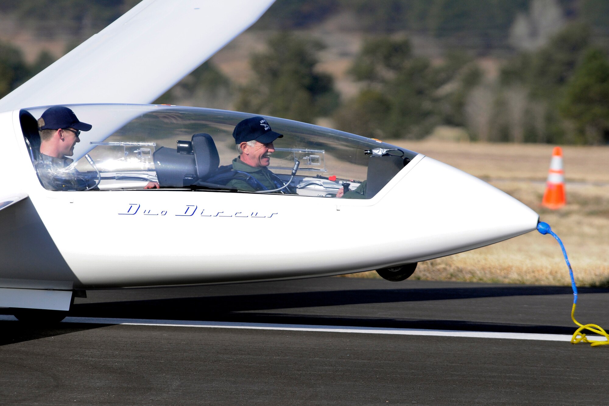 Chesley "Sully" Sullenberger, recipient of the 2009 Col. James Jabara Award for Airmanship, receives a 30-minute glider ride April 16 from instructor pilot Cadet 1st Class Joseph Baldwin. (U.S. Air Force photo/Dave Ahlschwede) 