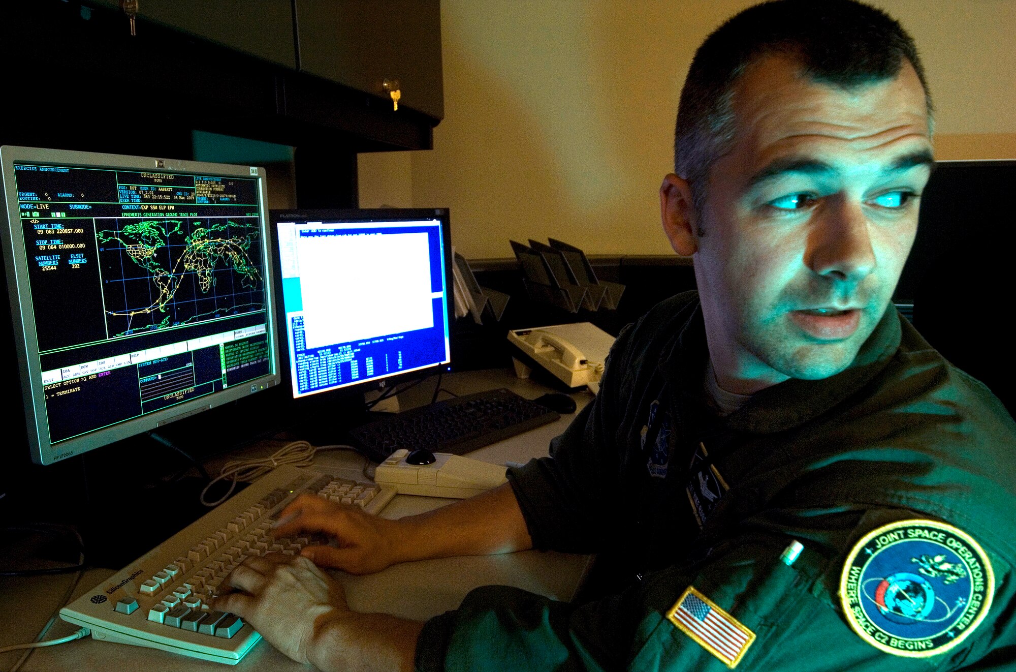 Tech. Sgt. Michael Roberts, a sensor management analyst at the Joint Space Operations Center at Vandenberg Air Force Base, Calif., verifies the accuracy of a radar tracking station's observations of several man-made objects floating in space. The purpose of the JSpOC is to provide a focal point for the operational employment of worldwide joint space forces, and enable the commander of Joint Functional Component Command Space to integrate space power into global military operations.  (U.S. Air Force photo/Staff Sgt. Vanessa Valentine) 