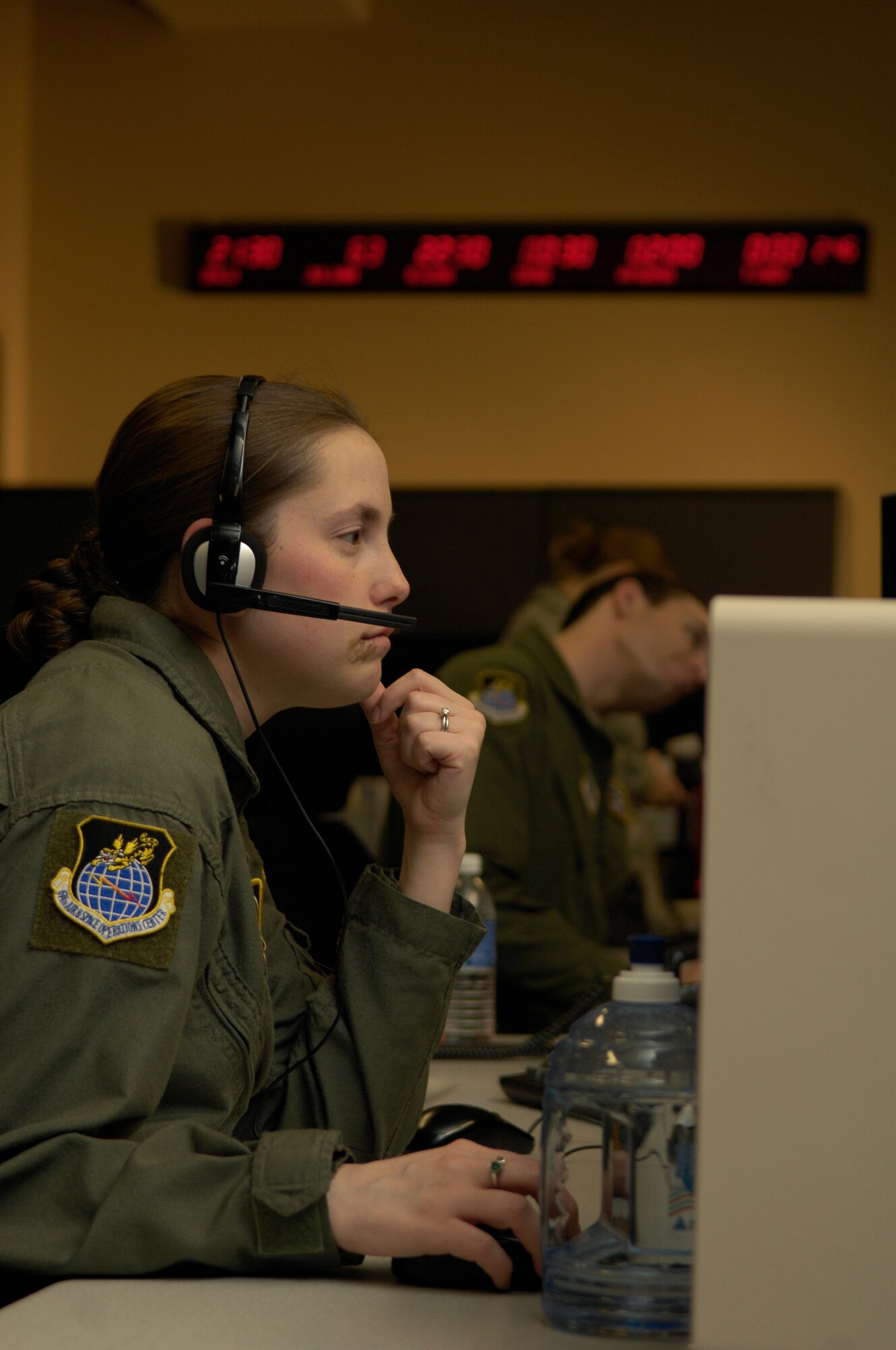 Tech. Sgt. Jennifer Hangley, a missile warning duty officer at the Joint Space Operations Center at Vandenberg Air Force Base, Calif., reviews data received from the Delta II site there. The purpose of the JSpOC is to provide a focal point for the operational employment of worldwide joint space forces, and enable the commander of Joint Functional Component Command Space to integrate space power into global military operations. (U.S. Air Force photo/Airman 1st Class Andrew Lee) 