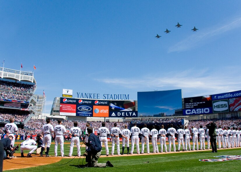 Four F-16C Fighting Falcons from the 174th Fighter Wing, Syracuse New York Air National Guard fly over center field at the "New" Yankee Stadium in Bronx, NY, on April 16, 2009. The jets were part of the Opening Day Ceremony. (US Air Force photo by Tech. Sgt. Jeremy M. Call/Released))