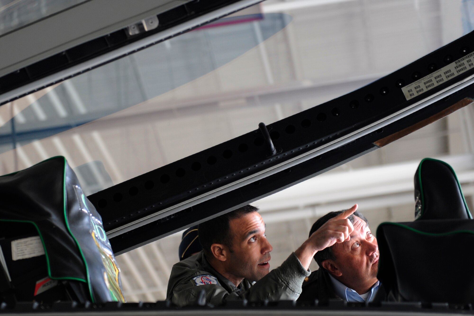 LANGLEY AIR FORCE BASE, Va. --  Gen. Jorge Ballasteros Rodriquez, Colombian air force commander, receives a tour of a F-22A Raptor cockpit from Lt. Col. Adrian Spain, 94th Fighter Squadron commander, here April 13.  General Rodriquez visited Langley to receive a tour of the day-to-day Air Force mission.  (U.S. Air Force photo/Senior Airman Vernon Young)