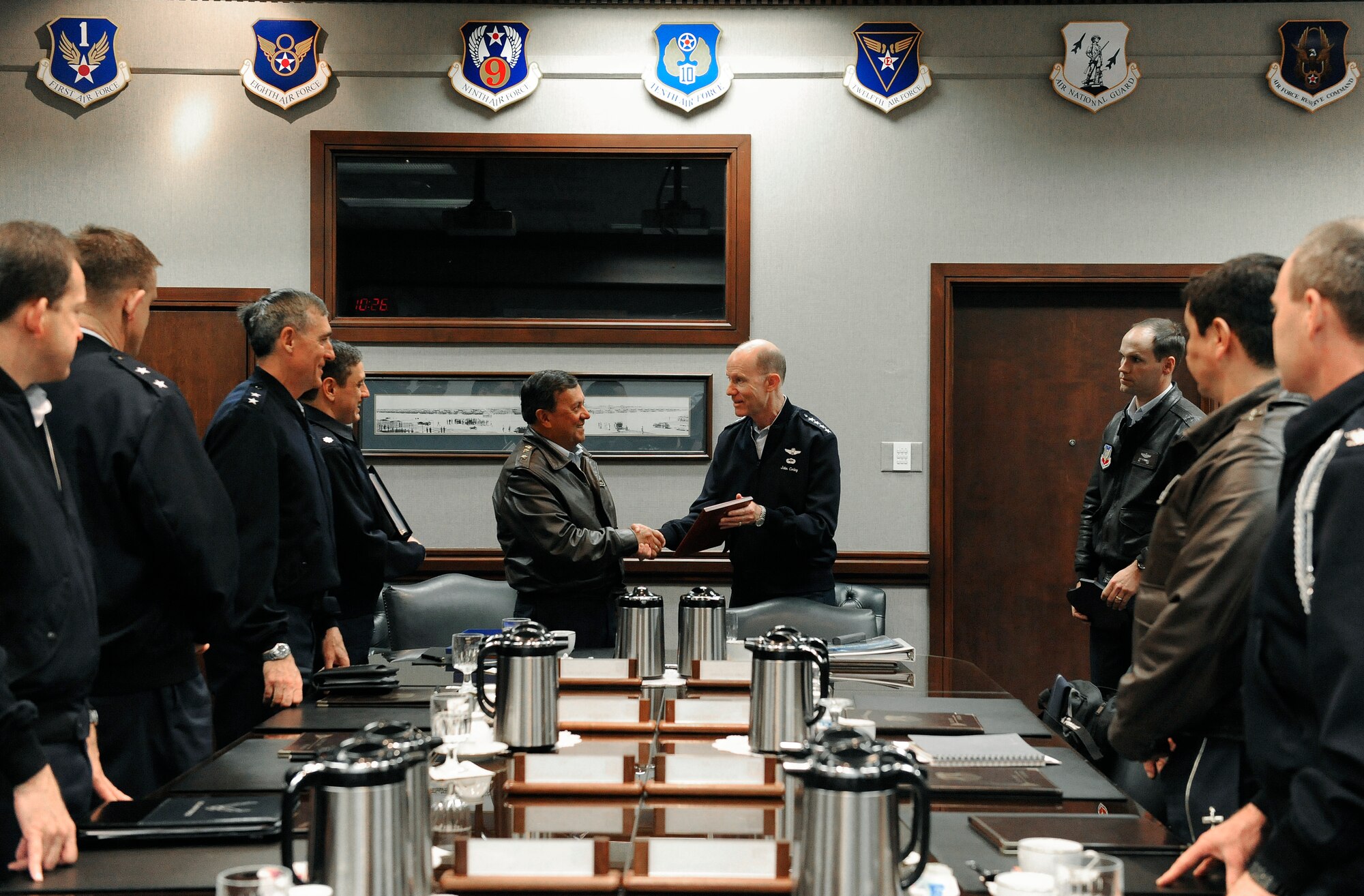 LANGLEY AIR FORCE BASE, Va. --  Gen. John D. W. Corley, Air Combat Command commander, presents a gift to Gen. Jorge Ballesteros Rodriguez, Colombian air force commander, here April 13.  General Rodriquez received a tour of the day-to-day Air Force mission.  (U.S. Air Force photo/Senior Airman Vernon Young)