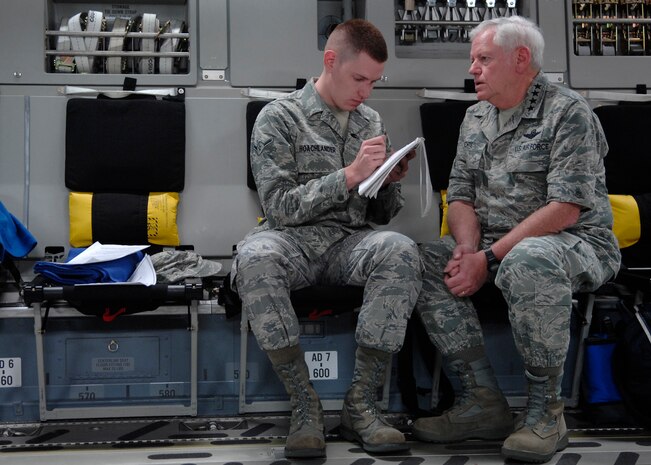 Airman Ian Hoachlander interviews Gen. Arthur Lichte while onboard a C-17 enroute to Charleston AFB Apr. 16. General Lichte came to Charleston for a two-day base visit where he toured various facilities. General Lichte is the commander of Air Mobility Command, Scott AFB, Ill. and Airman Hoachlander is a member of the 437th Airlift Wing Public Affairs Office. (U.S. Air Force photo/Senior Airman Katie Gieratz)