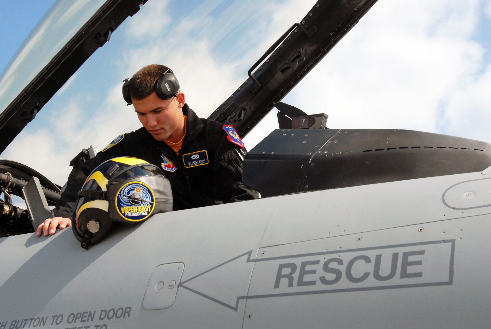 Senior Airman Austin Griggs of the U.S. Air Force Viper East F-16 Demo Team conducts a post-flight check of an F-16 Fighting Falcon at the Kentucky Air National Guard Base on April 16.  The demo team, based at Shaw Air Force Base, S.C., will be participating in this weekend's Thunder Over Louisville air show. (USAF photo by Senior Airman Malcolm Byrd.)