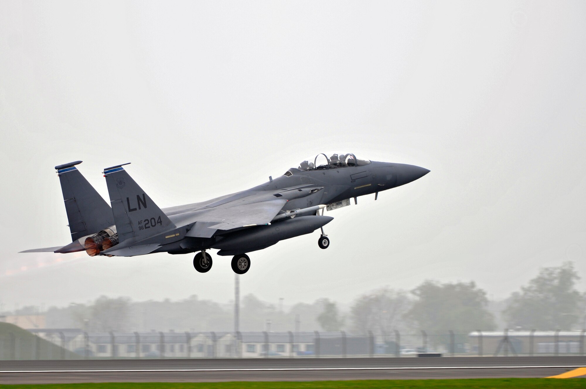 ROYAL AIR FORCE LAKENHEATH, England -- An F-15E Strike Eagle takes off for Campia Turzii, Romania here, April 17, 2009. 494th Fighter Squadron Airmen will have the opportunity to train with MiG-21L's to improve their tactical flying skills. (U.S. Air Force photo by Airman 1st Class Perry Aston) (Released)