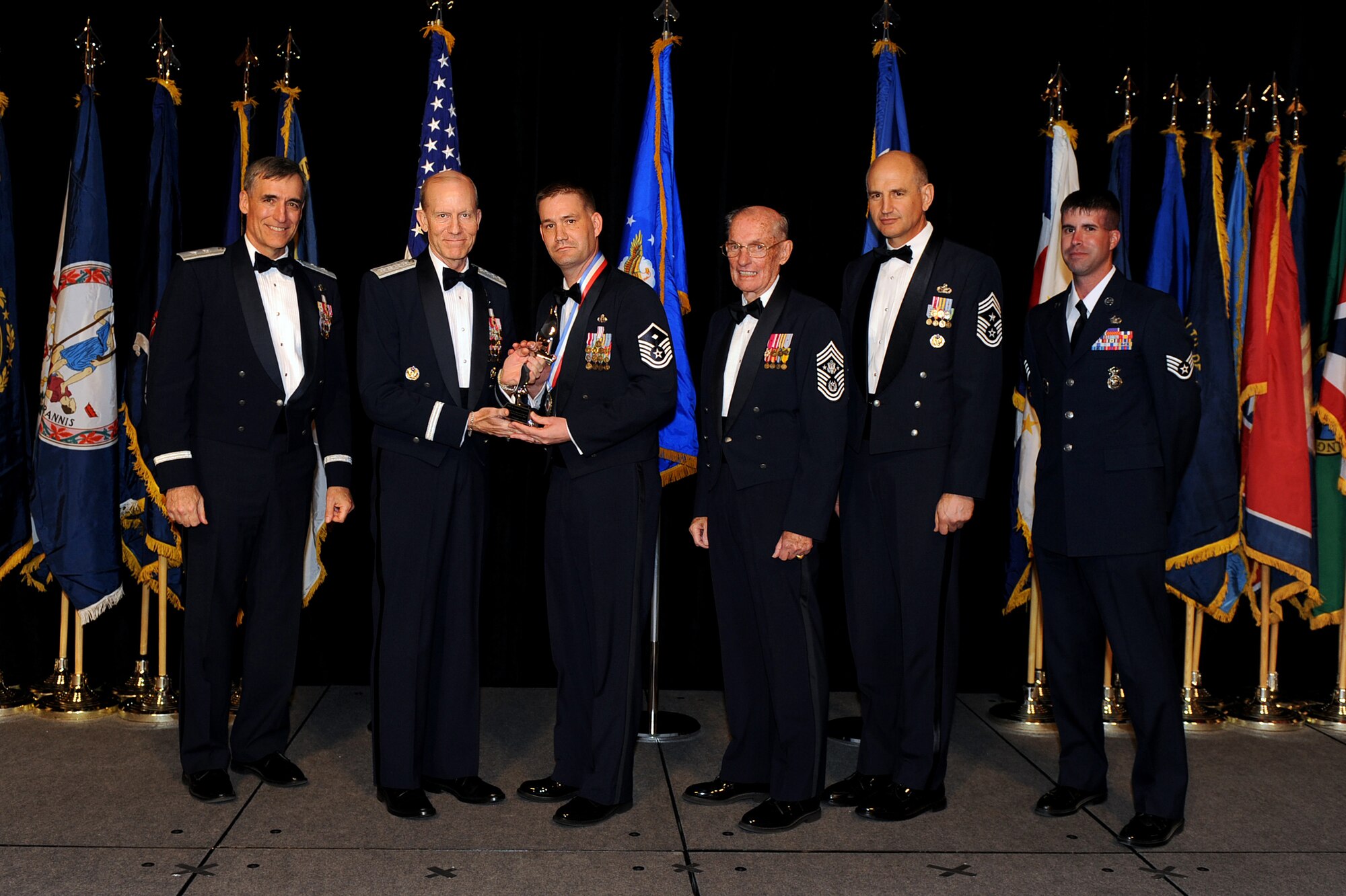 OFFUTT AIR FORCE BASE, Neb. - Master Sgt. Christopher Fowler, Mountain Home Air Force Base, earns the award for Outstanding First Sergeant of the year in the Air Combat Command's annual awards ceremony hosted at the Hilton hotel, Omaha, Neb., April 15.

U.S. Air Force Photo by Josh Plueger
