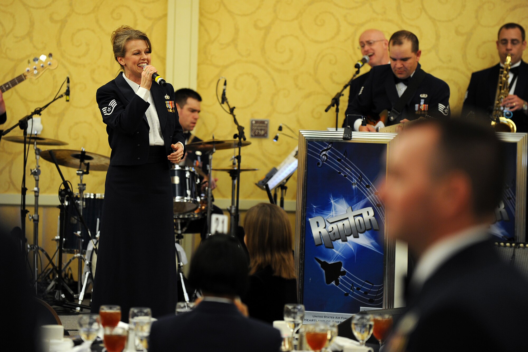 OFFUTT AIR FORCE BASE, Neb. - Staff Sgt. Krista Joyce, vocalist with the Heartland of America Band's Raptor Jazz ensemble, performs during the 2009 Air Combat Command Outstanding Airmen of the Year Recognition Gala at the Omaha Hilton, April 15.  

U.S. Air Force Photo by Josh Plueger

