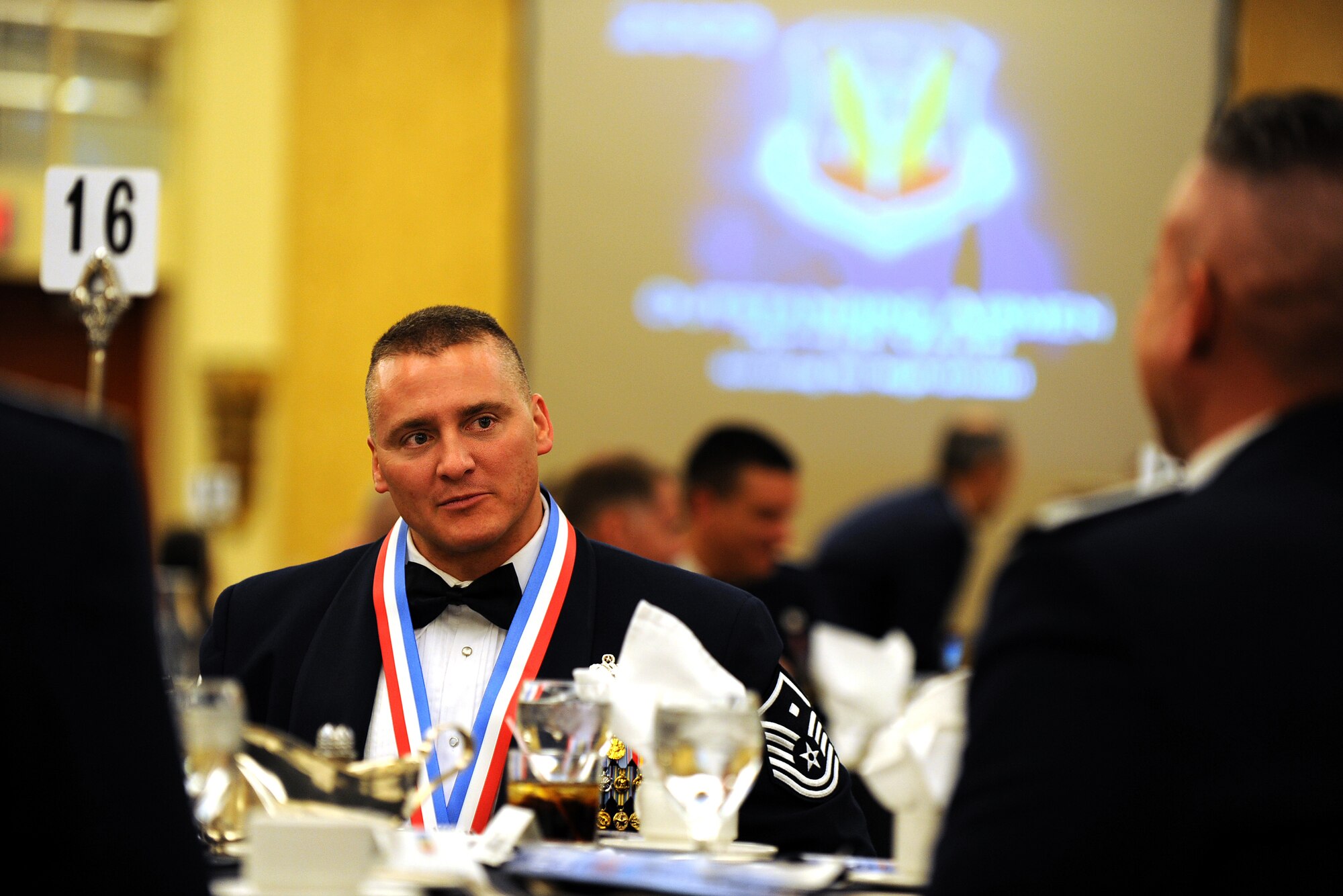 OFFUTT AIR FORCE BASE, Neb. - Master Sgt. Max Rippel, Davis-Monthan AFB, converses with guests at his table located in the Banquet Hall of Omaha's Hilton hotel during the 2009 Air Combat Command Outstanding Airmen of the Year Recognition Gala April 15.

U.S. Air Force Photo by Josh Plueger
