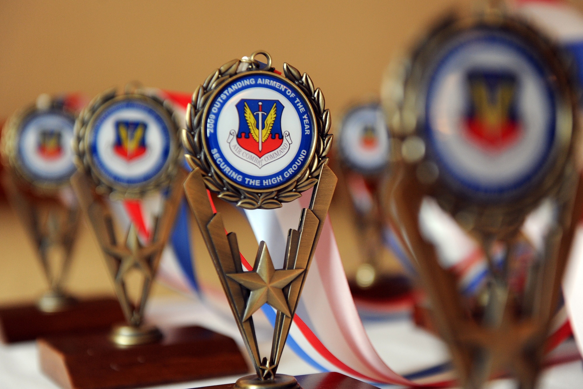 OFFUTT AIR FORCE BASE, Neb. - Nominee medallions line a table located in the Omaha Hilton prior to being of the 2009 Air Combat Command Outstanding Airmen of the Year Recognition Gala Medallion Ceremony April 15. Airmen who have earned the right to be honored will wear the medallions as the marker for being the best-of-the-best. 

U.S. Air Force Photo by Josh Plueger