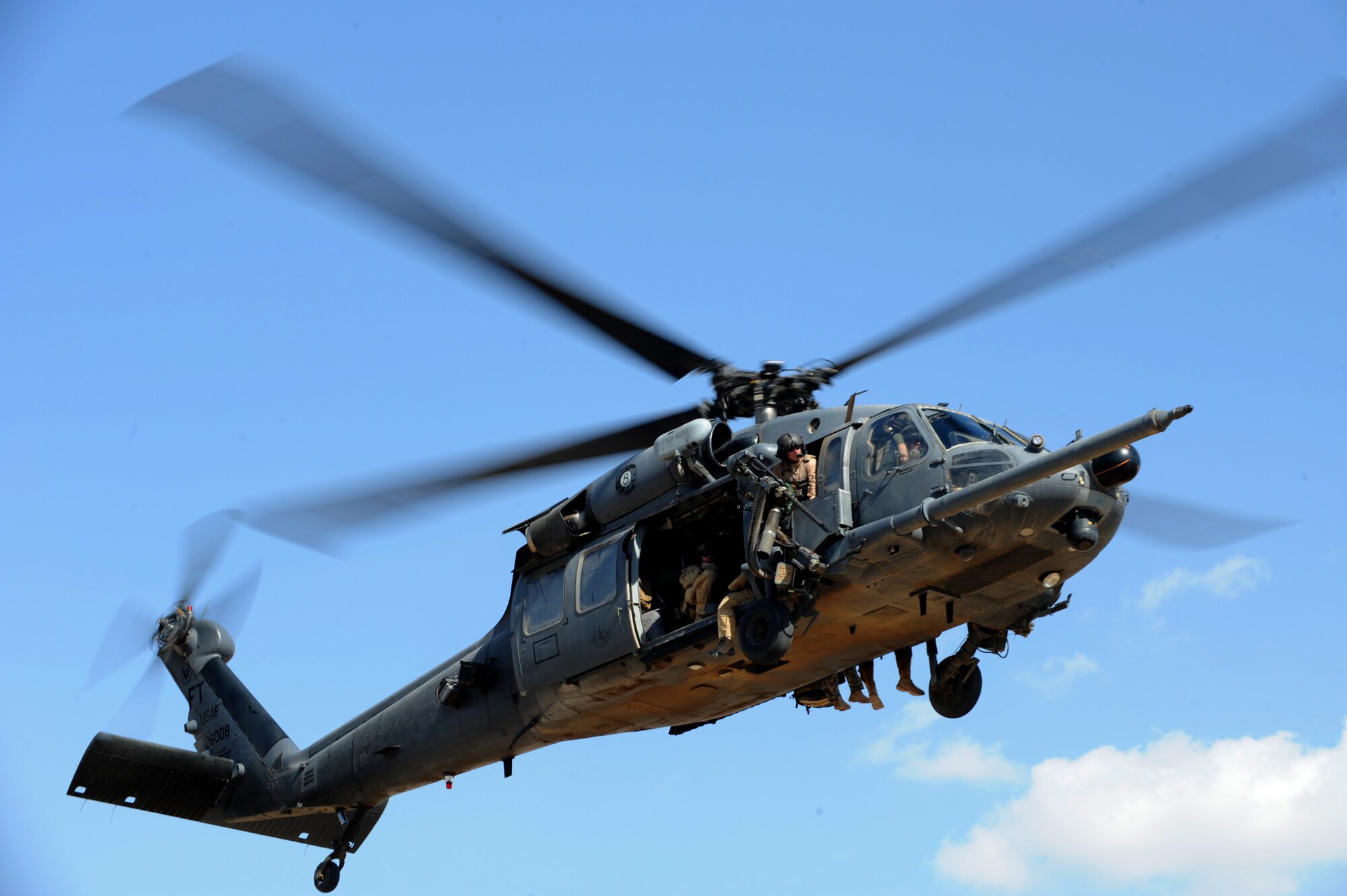 A U.S. Air Force HH-60 Pavehawk from the 64th Expeditionary Rescue Squadron, Joint Base Balad, Iraq, comes in for a landing during a proficiency exercise April 10, 2009, in support of Operation Iraqi Freedom.  (U.S. Air Force photo by Staff Sgt. James L. Harper Jr.)