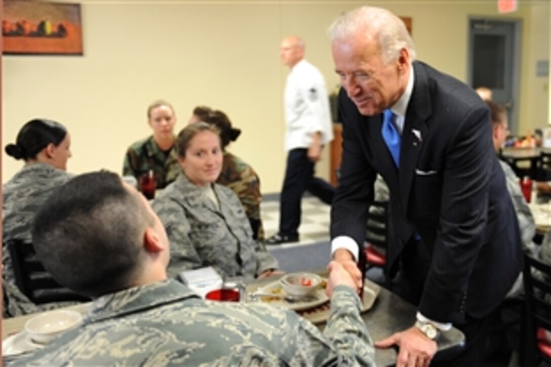 Vice President Joe Biden shakes hands with troops on Whiteman Air Force Base, Mo., April 16, 2009. He told airmen that the U.S. government was investing $17.8 million to modernize Whiteman and improve the quality of life for its troops.