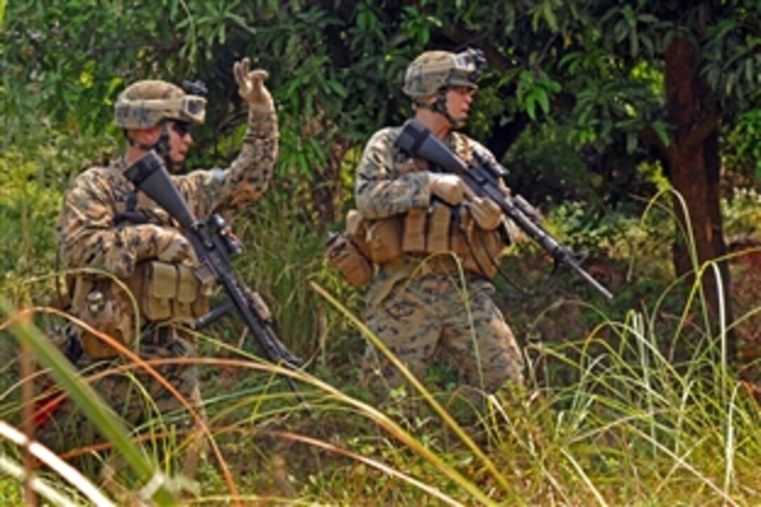 U.S. Marines conduct an air raid exercise at Basa Air Base, Philippines, April 14, 2009. The air raid exercise is being conducted with Philippine marines as part of Balikatan 09, which is a bilateral exercise with the Armed Forces of the Philippines, hosted by U.S. Pacific Command. 