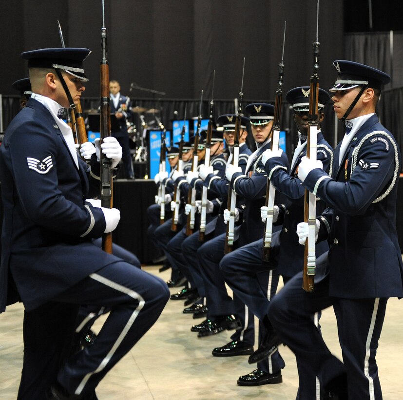 LANGLEY AIR FORCE BASE, Va.-- Members of the Air Force Honor Guard perform during the opening ceremony of the Hampton Roads Air Force Week April 18. The ceremony kicked off a week of activities that will allow the community an opportunity to meet Air Force members, see how they help protect America, and allow them to say “thank you” for their support. (U.S. Air Force photo/Airman 1st Class Gul Crockett)