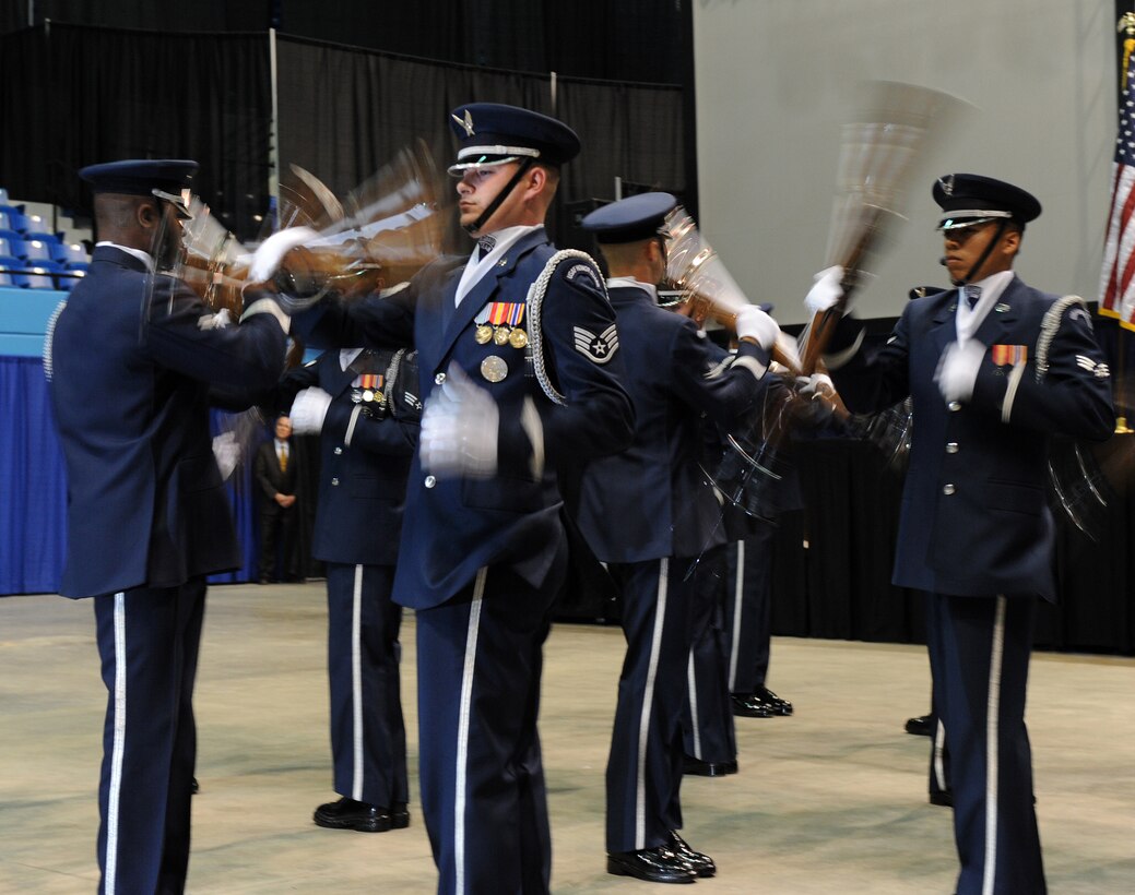 LANGELY AIR FORCE BASE, Va. -- Members of the Air Force Honor Guard perform during the opening ceremony of Air Force Week at Hampton University April 18. The ceremony kicked off a week of activities that will allow the community an opportunity to meet Air Force members, see how they help protect America, and allow them to say "thank you" for their support. (U.S. Air Force photo/Airman 1st Class Zachary Wolf) 