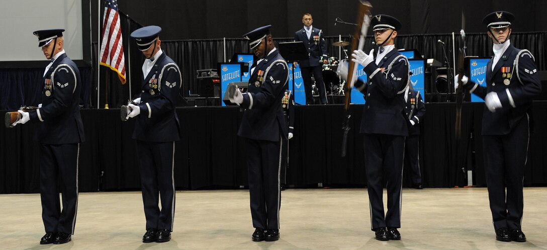LANGELY AIR FORCE BASE, Va. -- Members of the Air Force Honor Guard perform during the opening ceremony of Air Force Week at Hampton University Apr. 18.  Air Force Week is a week of activities that will allow the community an opportunity to meet Air Force members, see how they help protect America, and allow them to say "thank you" for their support.  (U.S. Air Force photo/Airman 1st Class Zachary Wolf)

