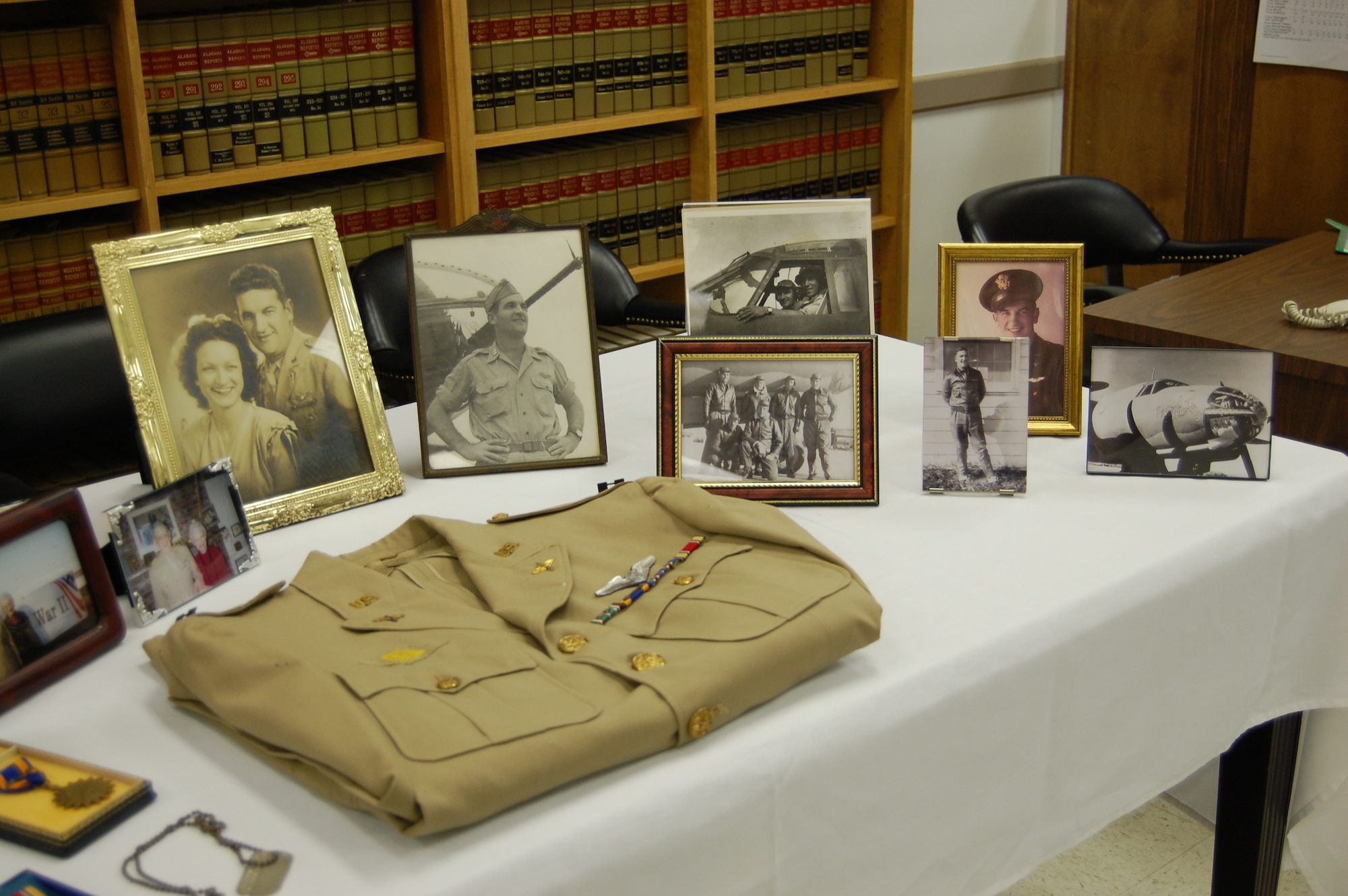 World War II memories of Capt. William Norred were on display during a ceremony Monday in Greenville, Ala., where his widow was presented the Distinguished Flying Cross he earned in WWII flying a combat mission in a B-26 Marauder in Africa.  Mrs. Norred said her husband may have been pleased with the ceremony as well as a little embarrassed. (Air Force photo by Carl Bergquist)