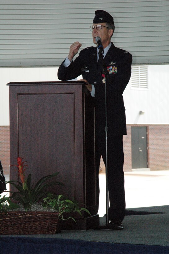 Col. Tim Wrighton, the outgoing commander of the 315th Airlift Wing here at Charleston Air Force Base, gives thanks and praise to family, friends, as well as, to the hardworking members of the 315th AW prior to relinquishing command to Col. Steven Chapman April 19. (U.S. Air Force photo by Senior Airman Dani Pacheco)