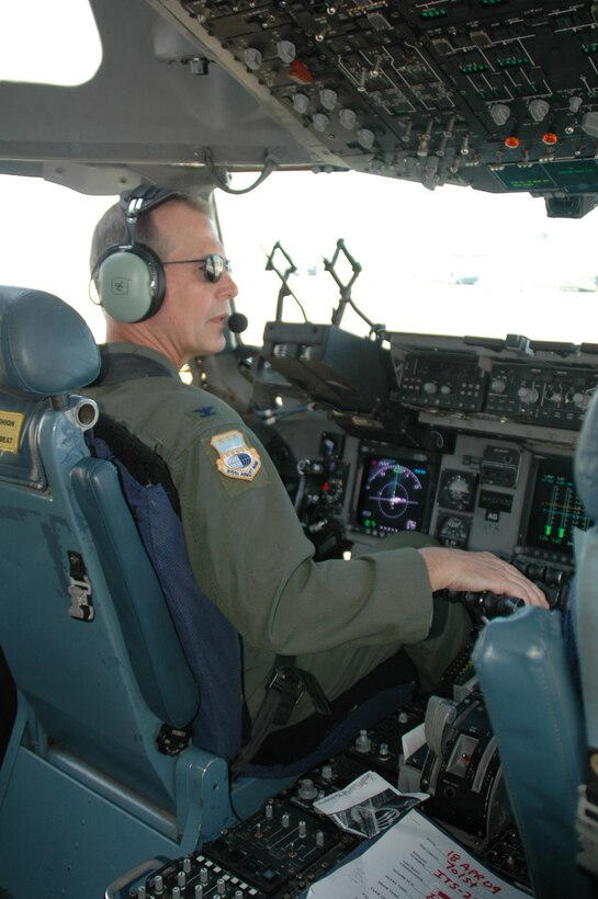 Col. Tim Wrighton, commander of the 315th Airlift Wing here at Charleston Air Force Base, flew his "Fini Flight" aboard a C-17 April 18. Col. Wrighton is scheduled to relinquish command of the 315th Airlift Wing in an official ceremony at Charleston Air Force Base April 19. 