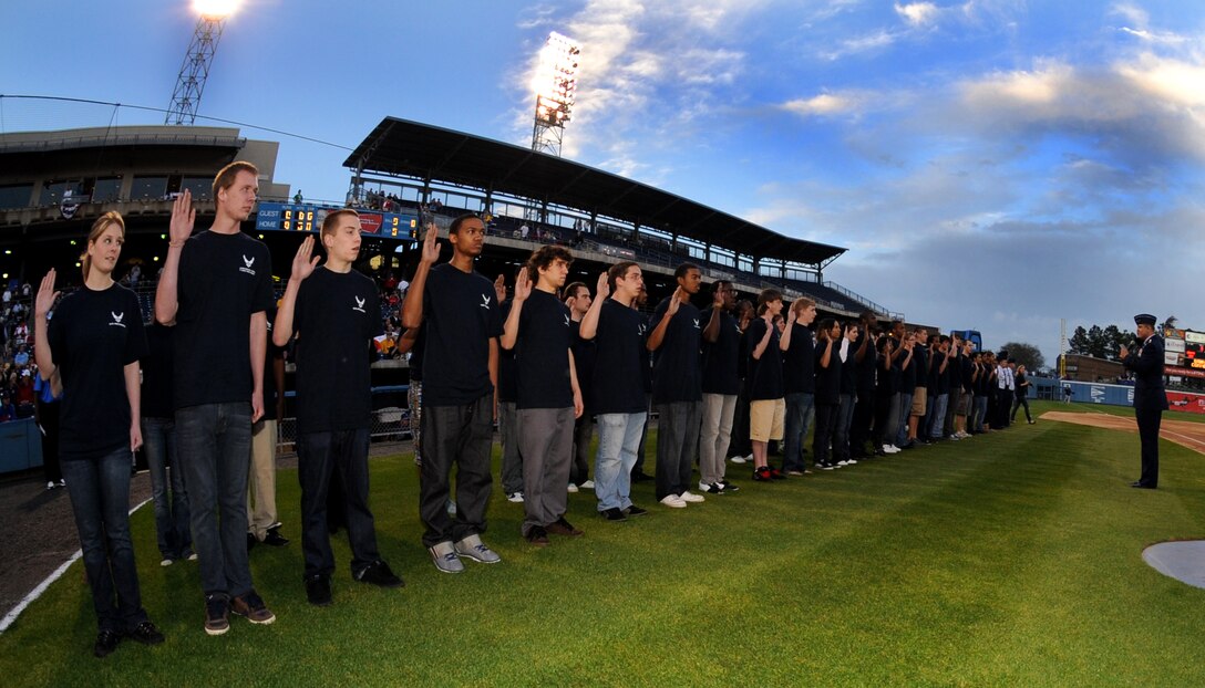 LANGLEY AIR FORCE BASE, Va. -- Maj. Gen. Frank Gorenc, Air Combat Command air and space operations directorate, administers the oath of enlistment to the 45 Air Force Delayed Entry Program participants from the Hampton Roads area at the Norfolk Tides baseball season opener April 20 during Air Force Week.  AF Week is the Air Force's chance to thank those who support the military through a variety of events.   (U.S. Air Force photo/Senior Airman Scott Aldridge)