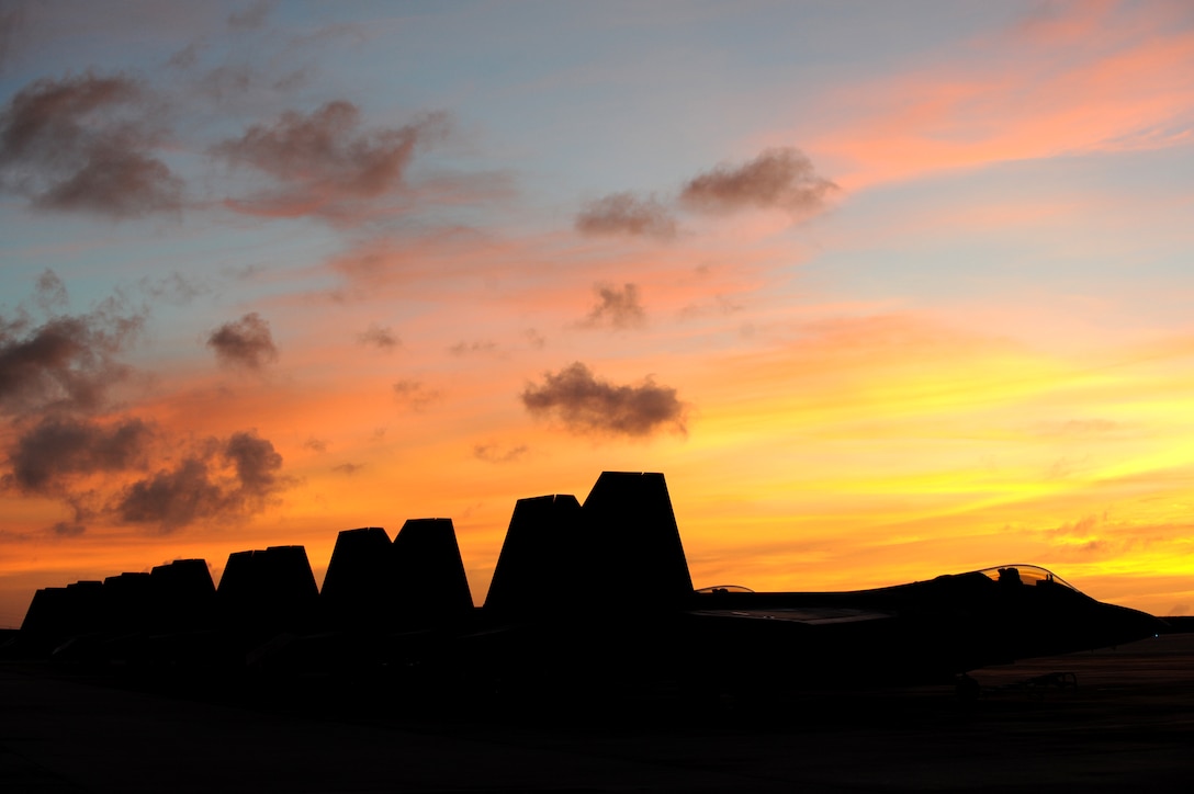 F-22 Raptors from the 90th Fighter Squadron from Elmendorf Air Force Base, Alaska line the Andersen Air Force Base Guam flightline on April 15. The 90th FS from Elmendorf Air Force Base, Alaska just completed a 3-month deployment to Andersen as part of a theater security package. The stealth-fighters, along with associated maintenance and support personnel participated in various exercises that provided routine training in an environment different from their home station. The F-22 is a highly maneuverable combat aircraft that can avoid enemy detection, cruise at supersonic speeds, and provide the joint force commander an unprecedented level of integrated situational awareness.

(U.S. Air Force photo/ Master Sgt. Kevin J. Gruenwald) released



















  












 











































  












 

























