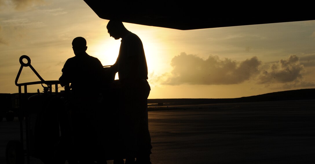 Crew chiefs Staff Sgt. Chad Konyndyk and Airman 1st Class Michael Biggs, 36th Expeditionary Maintenance Squadron, review F-22 Raptor data April 15 at Andersen Air Force Base, Guam.  The 90th Fighter Squadron from Elmendorf Air Force Base, Alaska just completed a 3-month deployment to Andersen Air Force Base, Guam as part of a theater security package. The stealth-fighters, along with associated maintenance and support personnel participated in various exercises that provided routine training in an environment different from their home station. The F-22 is a highly maneuverable combat aircraft that can avoid enemy detection, cruise at supersonic speeds, and provide the joint force commander an unprecedented level of integrated situational awareness.

(U.S. Air Force photo/ Master Sgt. Kevin J. Gruenwald) released



















  












 











































  












 

























