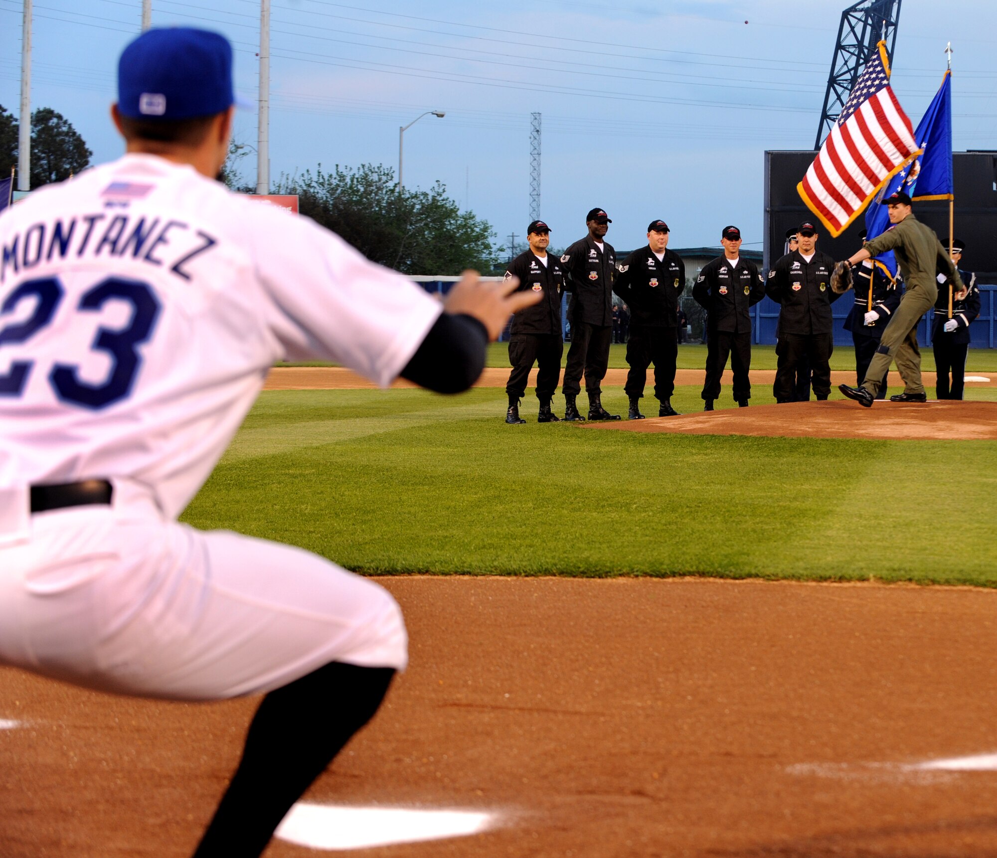 LANGLEY AIR FORCE BASE, Va. -- Maj. Dave Skalicky, F-22 Raptor Aerial Demonstration Team pilot, throws the first pitch of the Norfolk Tides baseball season opener April 20 during Air Force Week.  AF Week is the Air Force's chance to thank those who support the military through a variety of events.  (U.S. Air Force photo/Senior Airman Scott Aldridge)