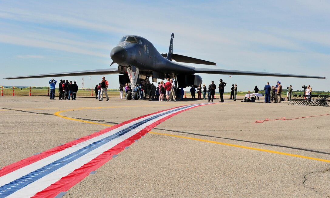 A 467-foot ribbon commemorating the take-off distance the Doolittle Raiders had on the USS Hornet, leads from a hangar door to a B-1 Lancer.  It was part of the celebration at Columbia Metro Airport in Columbia, S.C., during the 67th Doolittle Raider Reunion.  The 34th Bomb Squadron bomber was flown in from Ellsworth Air Force Base, S.D.  (U.S. Air Force Photo/Senior Airman William Coleman)