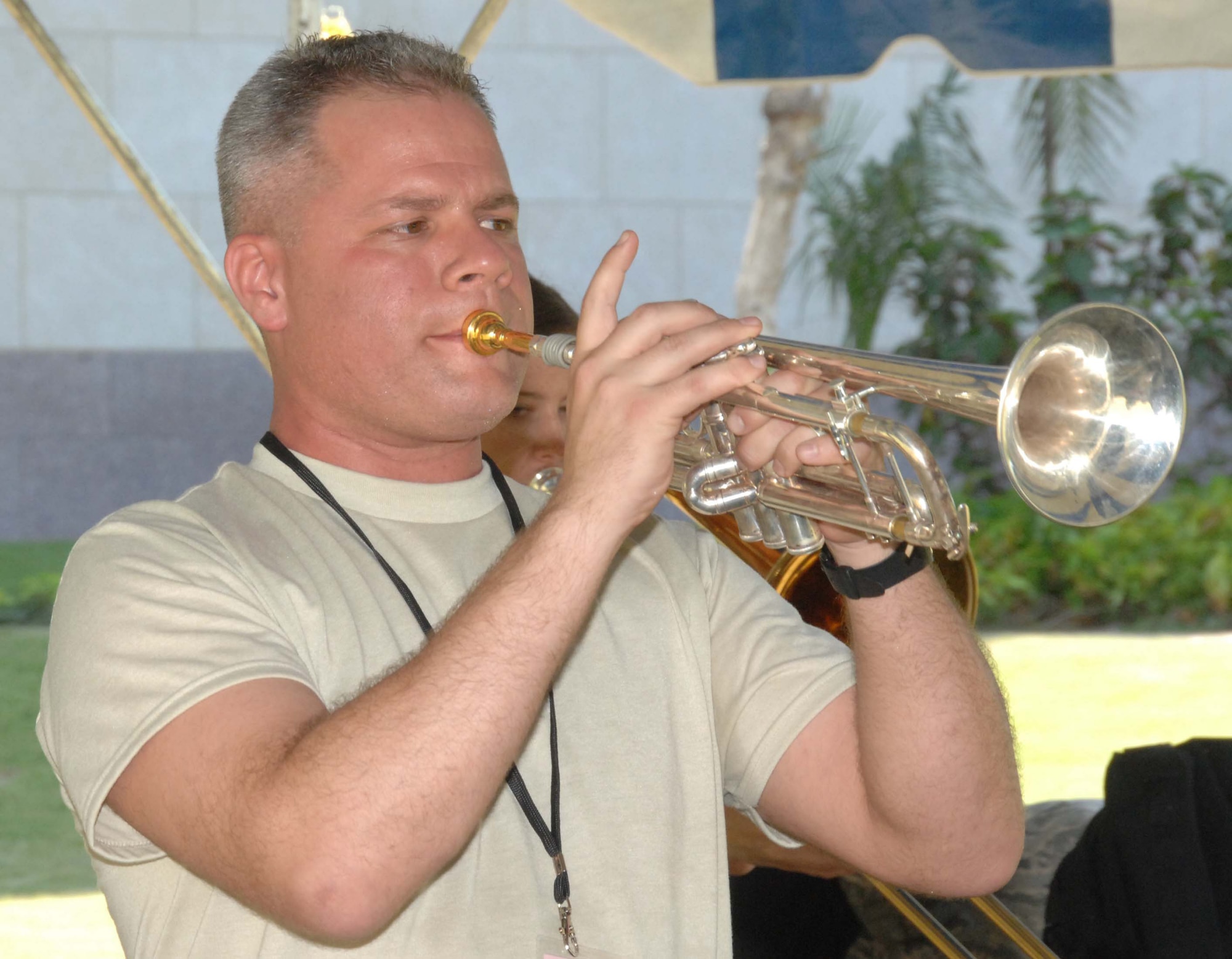 PORT-AU-PRINCE, Haiti -- Air Foce Tech. Sgt. Jeffery Castle plays for Haitian music students at the U.S. Embassy in Port-au-Prince, Haiti, April 15. Comfort is on a four month humanitarian and civic assistance mission to Latin America and the Caribbean region in support of Continuing Promise 2009. (U.S, Navy photo by Mass Communication Specialist 3r Marcus Suorez)