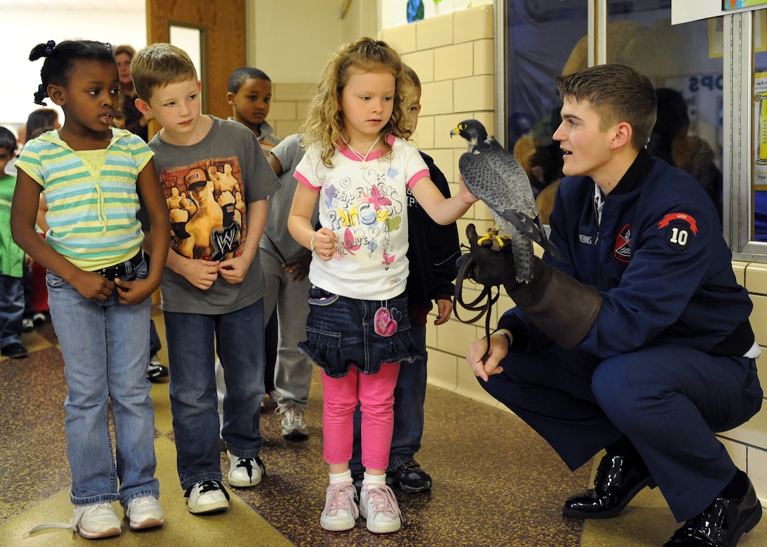 LANGLEY AIR FORCE BASE, Va.-- Cadet Ryan Kerns, United States Air Force Academy junior and falconer, shows the children of Alfred Forrest Elementary School in Hampton, Va.  the academy’s school bird ambassador "Havoc", a Peregrine Falcon April 20.  Cadet Kerns is visiting schools during Air Force Week to educate students about the Air Force. (U.S. Air Force photo/Airman 1st Class Gul Crockett)