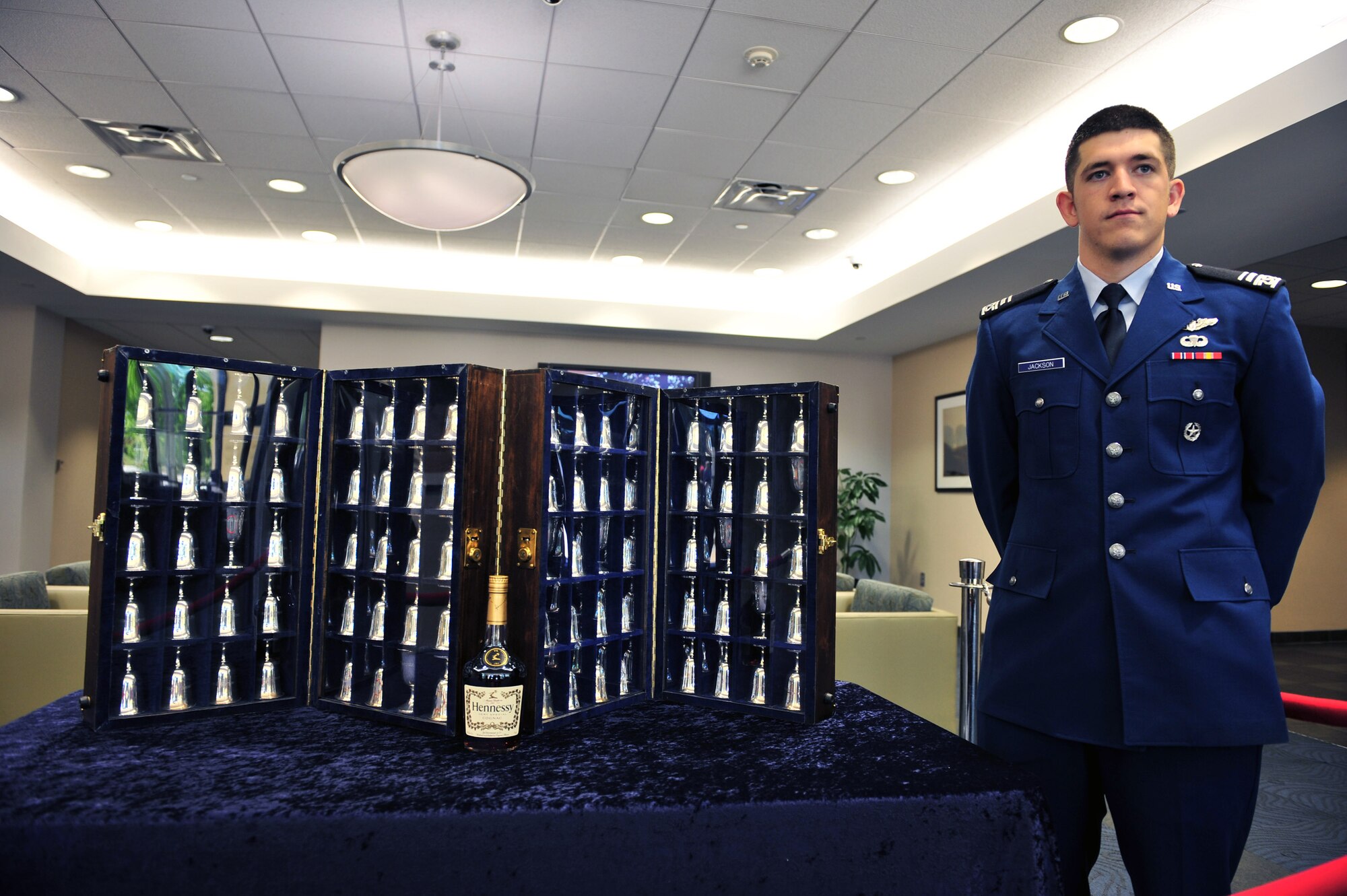 U.S. Air Force Academy Cadet 1st Class Dan Jackson guards the Doolittle Raiders silver goblets April 16 at Columbia, S.C. during a ceremony celebrating the 67th anniversary of the raid.  There are 80 goblets representing all 80 Doolittle Raiders.  When a raider passes on; the goblet is turned upside down. (U.S. Air Force photo/Senior Airman William Coleman)