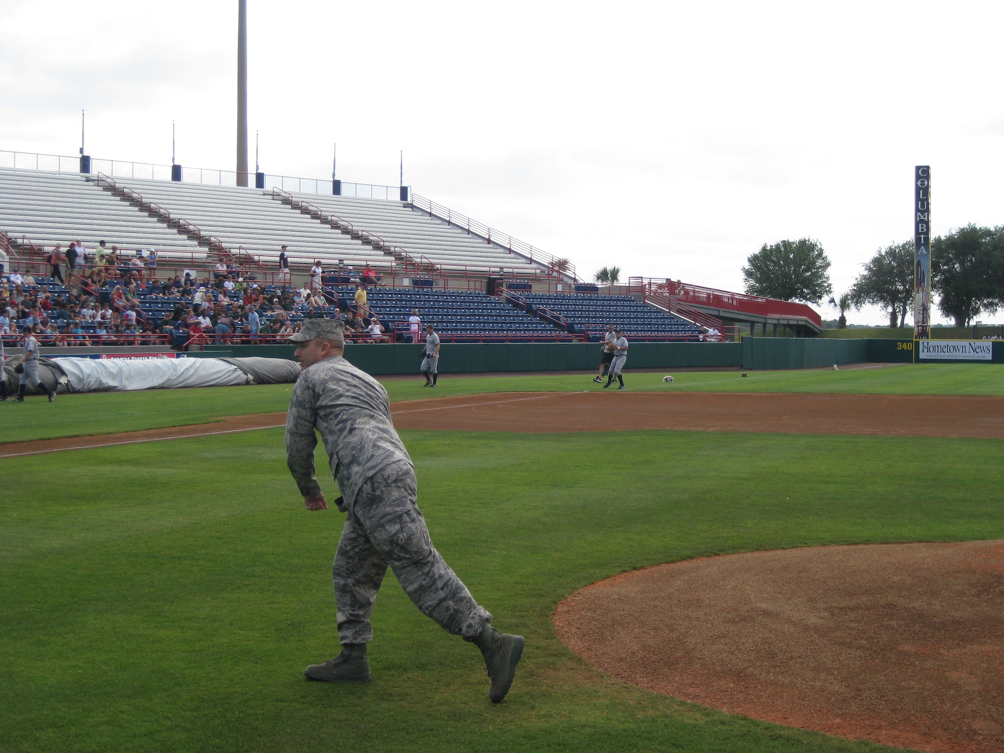 Col Michael Brice throws out the ceremonial first pitch during a Brevard Manatees game April 15 in Melbourne, Fla. Colonel Brice is the commander of the 369th Recruiting Group. (U.S. Air Force photo)
