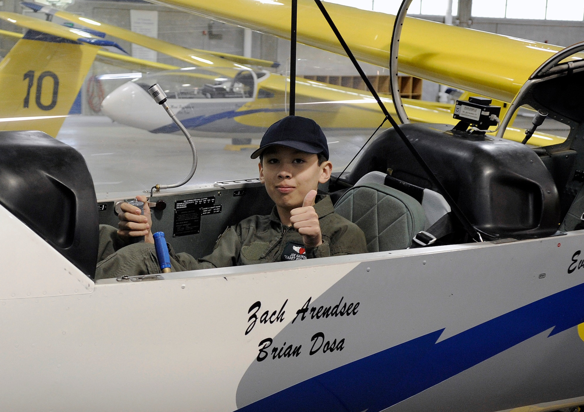 Cadet for a Day Joe Hayford sits in the cockpit of one of the U.S. Air Force Academy gliders during a visit to the Academy organized by the Make-A-Wish foundation. Cadet Hayford's three-day visit included numerous events sponsored by cadet squadron 4. (U.S. Air Force photo/Mike Kaplan)