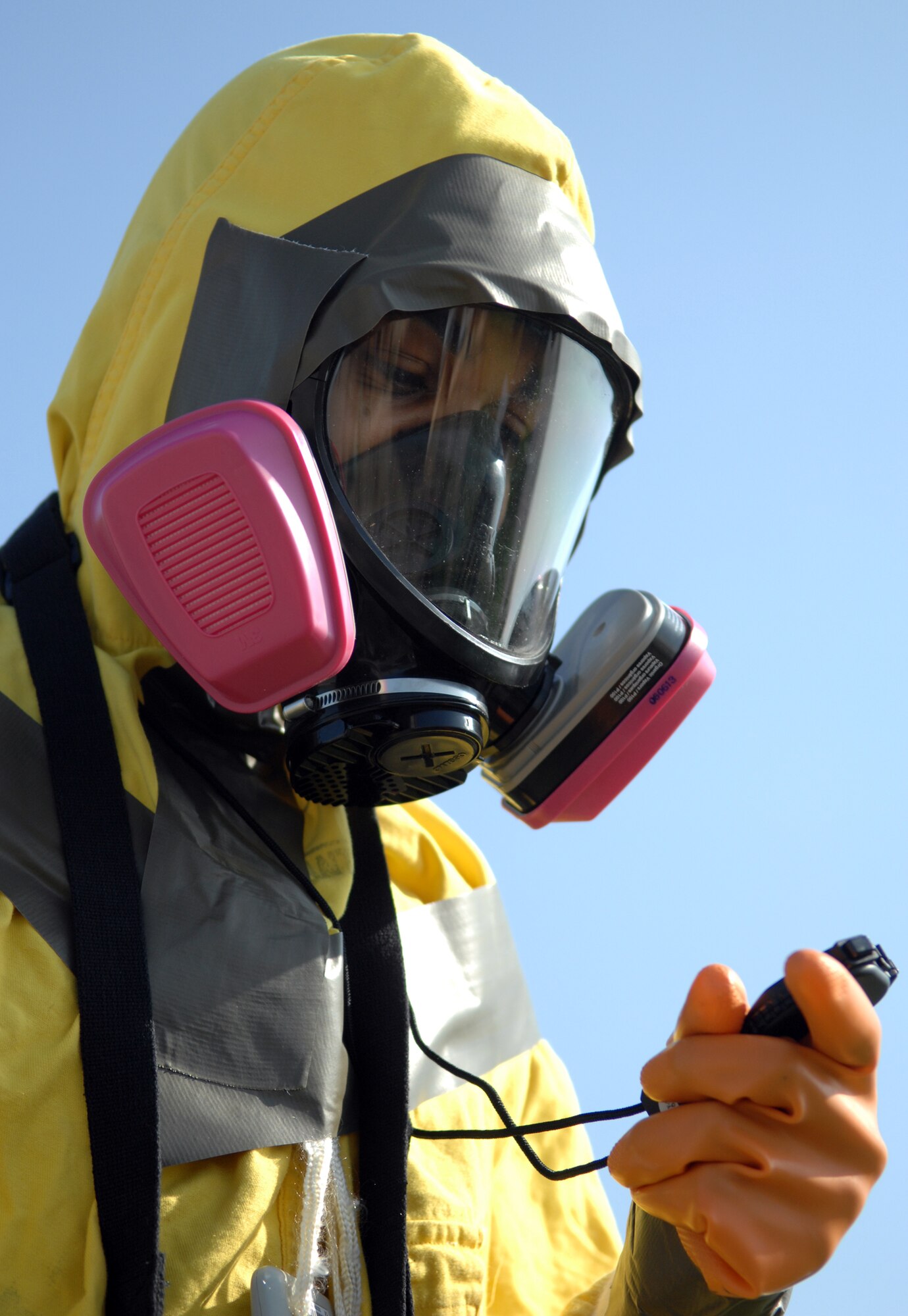WHITEMAN AIR FORCE BASE, Mo. - Airman 1st Class Eric Hayes, 509th Bioenvironmental Engineering, checks his equipment April 17 during an exercise scenario for the 2009 Air Combat Command Chemical, Biological, Radiological and Nuclear Challenge. The winners of the competition will compete against other CBRN task forces next spring. (U.S. Air Force photo/Senior Airman Stephen Linch)