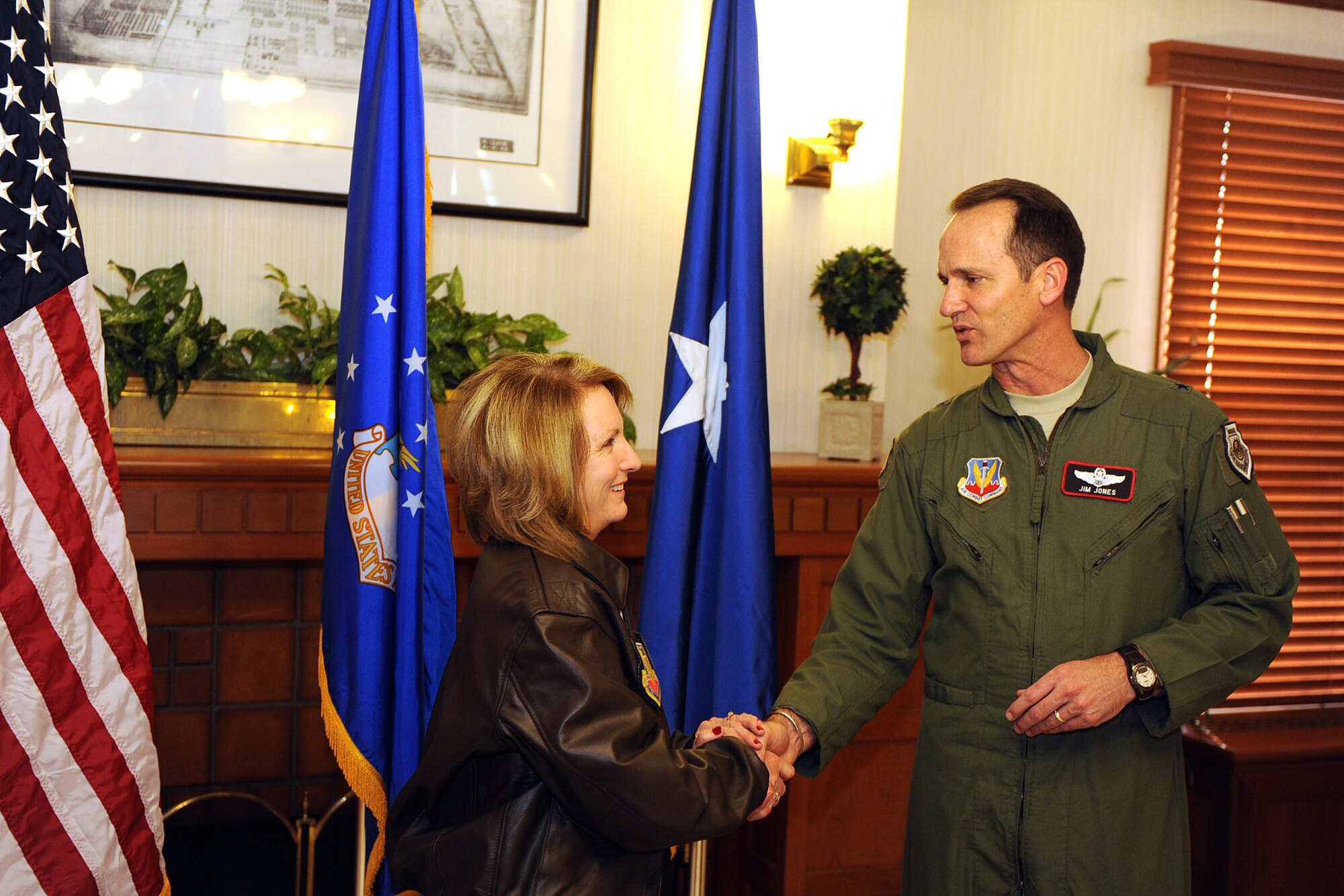 OFFUTT AIR FORCE BASE, Neb. - Brig. Gen. James J. Jones, 55th Wing commander, congratulates Gail DeBoer on her selection as a 55th WG Wingman following a small ceremony April 17. Mrs. DeBoer is the 15th civilian community member to be designated as a 55th WG Wingman for her constant support of Offutt military members and their families.

U.S. Air Force Photo by Josh Plueger
 

U.S. Air Force Photo by Josh Plueger
