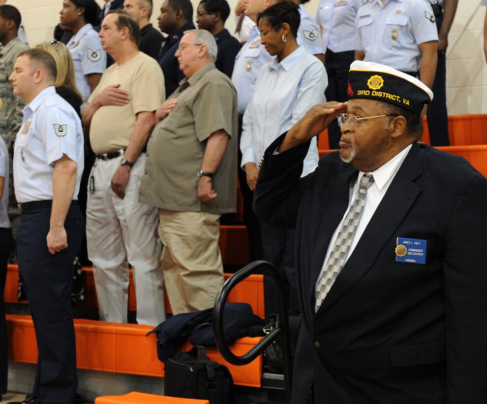 LANGLEY AIR FORCE BASE Va. -- James Holt, 3rd District American Legion commander, salutes during the playing of the national anthem during Hampton Roads Air Force Week's Honoring America's Veterans ceremony April 20.  Air Force Week is the Air Force's chance to thank those who support the military through a variety of free events.  (U.S. Air Force photo/Airman 1st Class Zachary Wolf) 