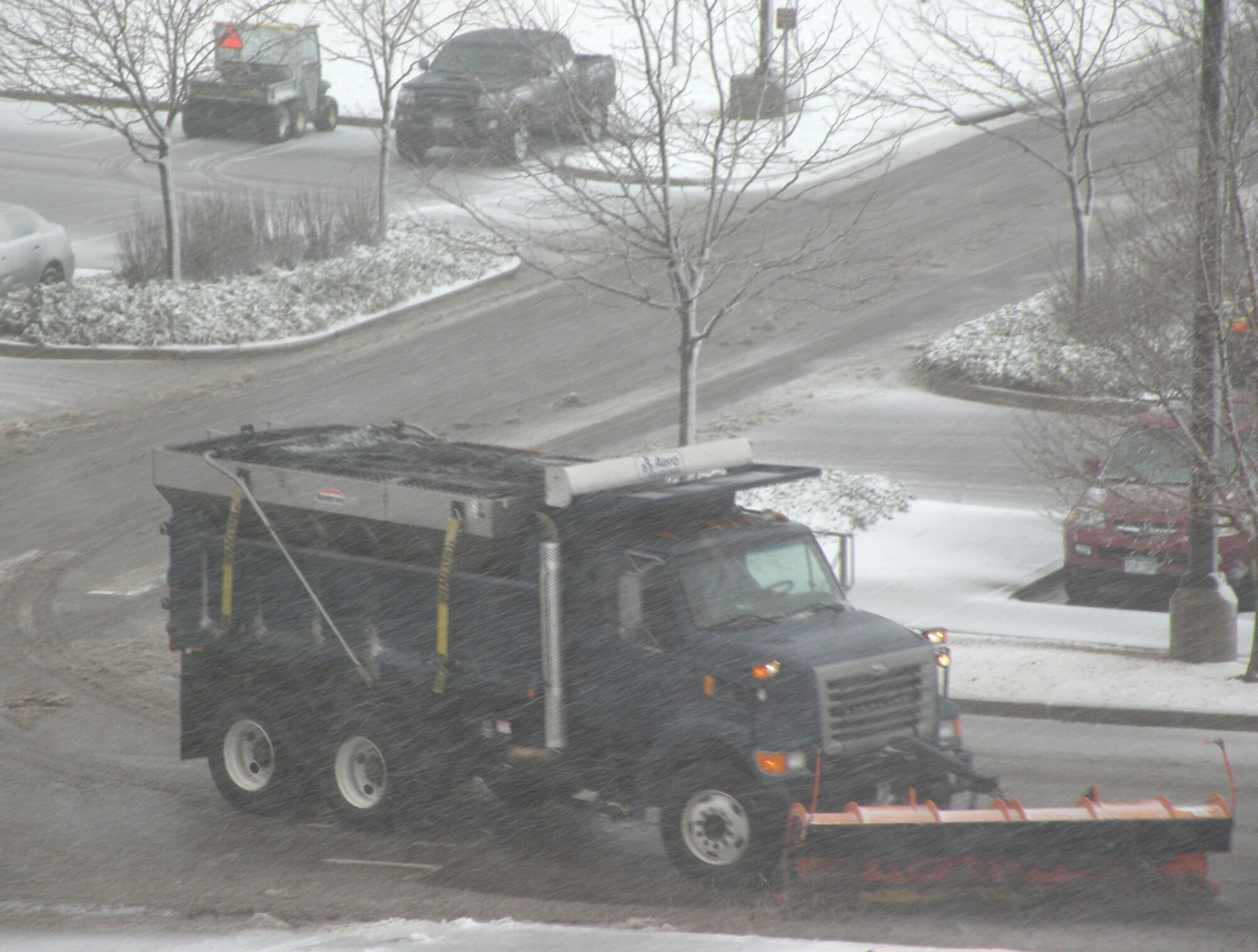 SCHRIEVER AIR FORCE BASE, Colo. - A snow plow clears base roads April 17. Road conditioins on base were yellow, with slick spots as snow continued to fall. Road conditions terms for the base are as follows: 
Green?Roads are clear. No unusual conditions to vehicle operations exist.
Yellow?Indicates conditions of limited visibility (less than 300 feet) or slick/snow-covered roads. Conditions require increased awareness by vehicle operators. Vehicle headlights will be turned on and all patrols must take necessary driving precautions.
Red?Indicates conditions of extremely limited visibility or icy roads with deep snow. Vehicle movement will be limited to mission-essential only. Vehicle operators will determine their status;security forces is not to stop vehicles. Vehicle speeds will be no faster than absolutely necessary. All vehicle operators must use headlights and extreme caution.
Black?Indicates condition of extreme hazard on roadways. Only emergency vehicles will operate on base roads, and only in an emergency. If vehicle movement is necessary, requirements of condition RED will be met.
Closed ?Schriever Air Force Base is closed. Military and DoD civilians are not permitted to come or go. Anyone coming on base while closed will not be permitted to leave. Mission essential personnel will remain in place until their replacements arrive. (U.S. Air Force photo/Staff Sgt. Amanda Delisle)

 

                               